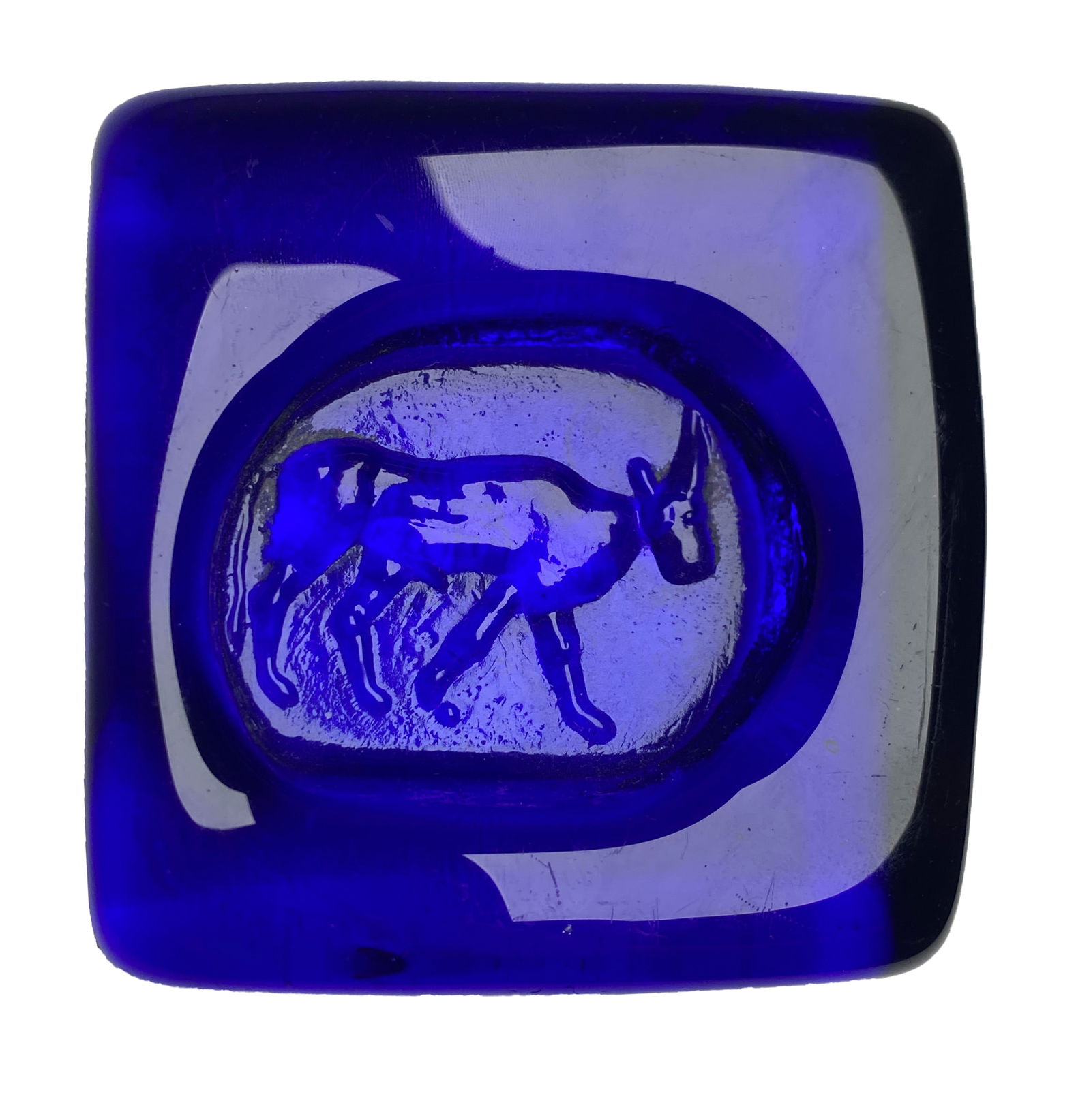 Erik Hoglund Cobalt Blue Glass Ashtray Bowl with Deer Motif - 1950s: Erik Hoglund Cobalt Blue Glass Ashtray Bowl with Deer Motif - 1950s A square, deeply colored cobalt blue glass ashtray bowl with softly rounded edges, featuring a recessed circular well. At its center