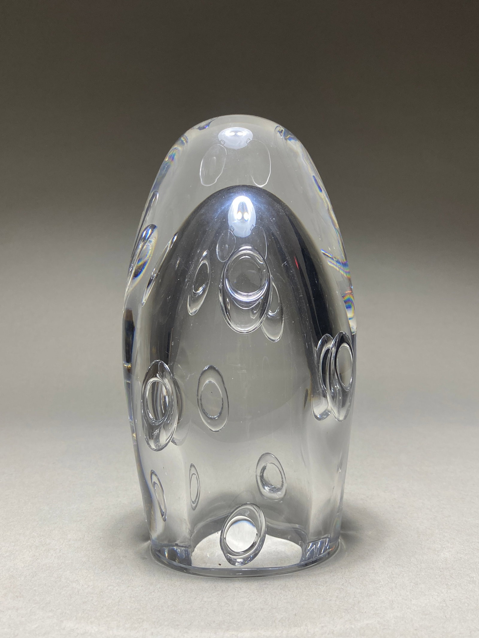 Celestial Lens Modernist Optical Art Glass Sculpture, Circa 1960-1970: Celestial Lens Modernist Optical Art Glass Sculpture, Circa 1960-1970 Art glass sculptures capture the essence of modernist design through its elongated, obelisk-inspired shape. The clear glass form i