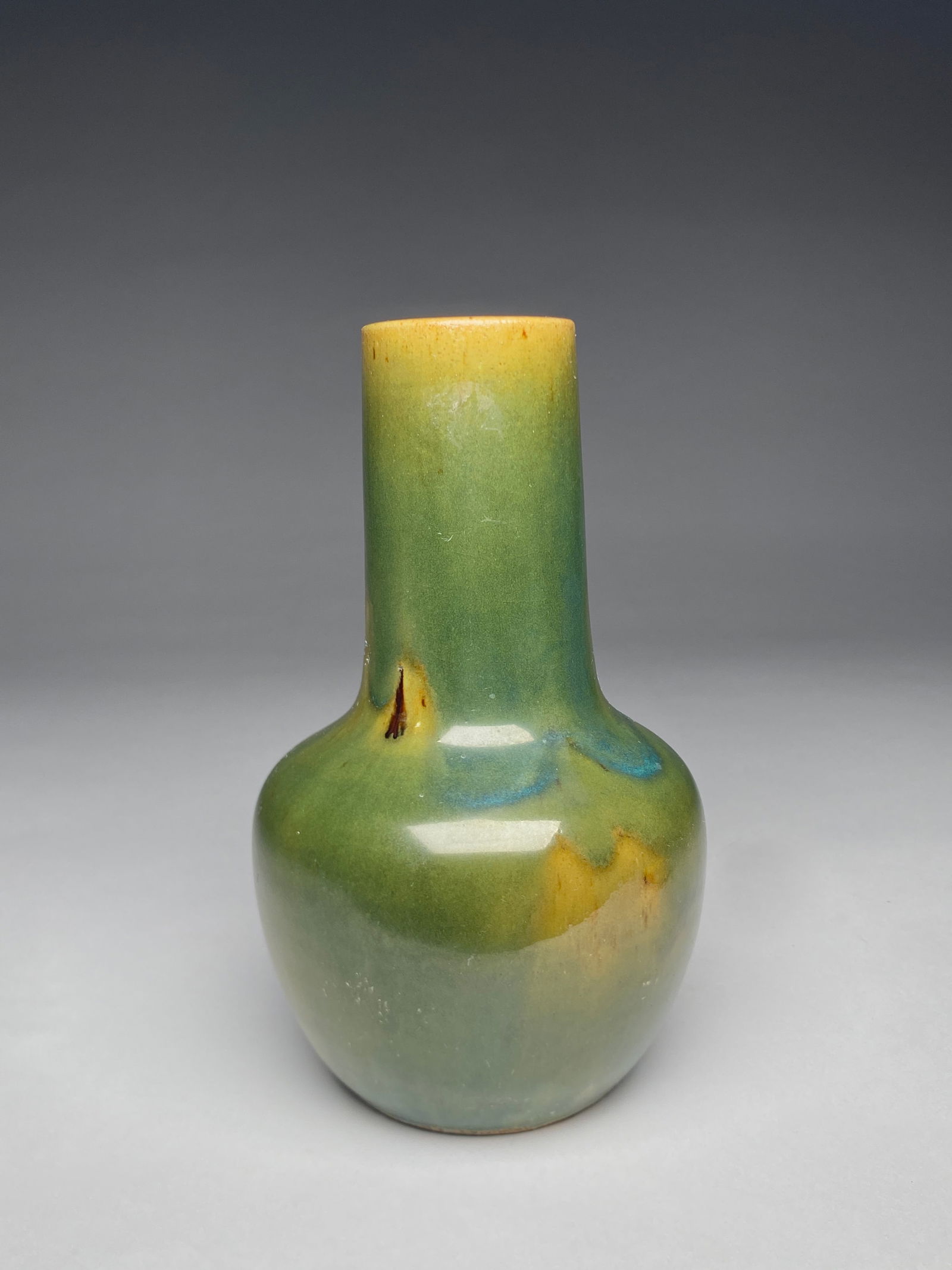 Edmond Lachenal Stoneware Green Cylindrical-Neck Vase - Early 20th Century: Edmond Lachenal Stoneware Green Cylindrical-Neck Vase - Early 20th Century Bottle form with rounded shoulders rising to a straight cylindrical neck. The surface is glazed in deep olive to forest green