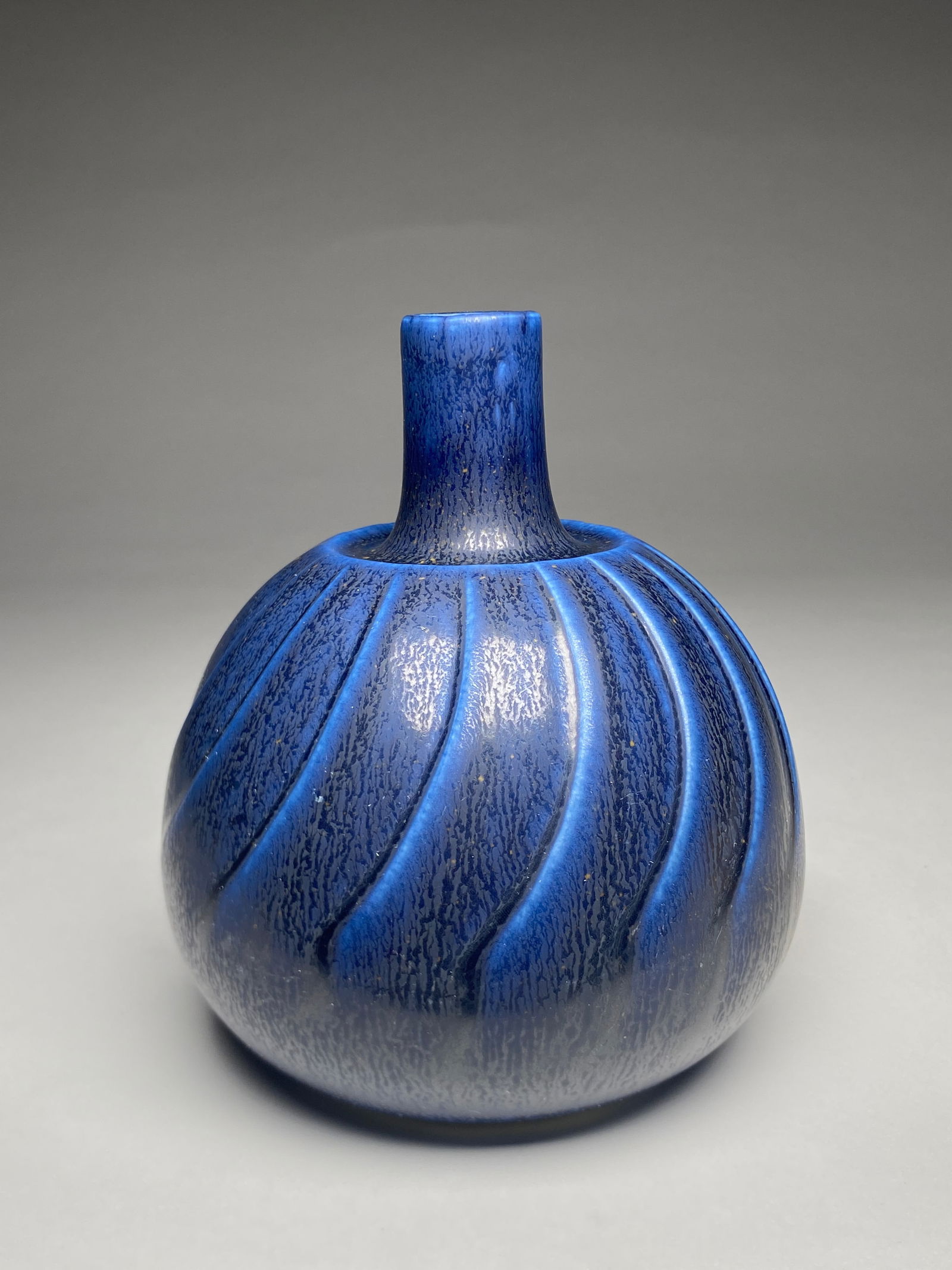 Wilhelm Kage for Gustavsberg, Sweden, Stoneware "Verkstad" Vase with Blue Haresfur Glaze -: Wilhelm Kage for Gustavsberg, Sweden, Stoneware "Verkstad" Vase with Blue Haresfur Glaze - c.1950s-60s A striking stoneware vase designed with a rounded, gourd-like body that rises into a slender cyli