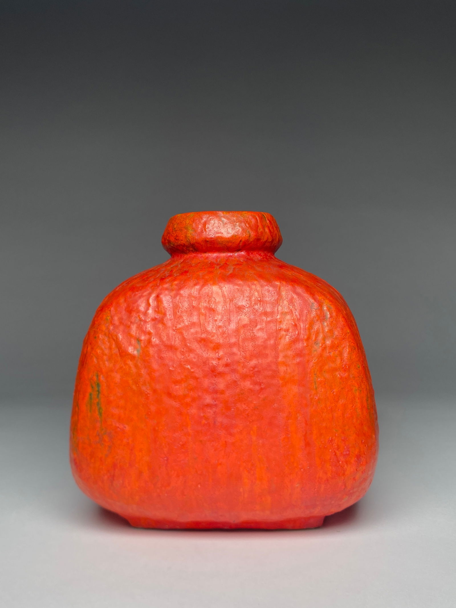 Ruscha West German Mid-Century Modern Fat Lava Ceramic Vase - 1960s: Ruscha West German Mid-Century Modern Fat Lava Ceramic Vase - 1960s The vase has a compact squared body with rounded edges and a short, recessed circular mouth. Its surface is coated in the vivid "Vul