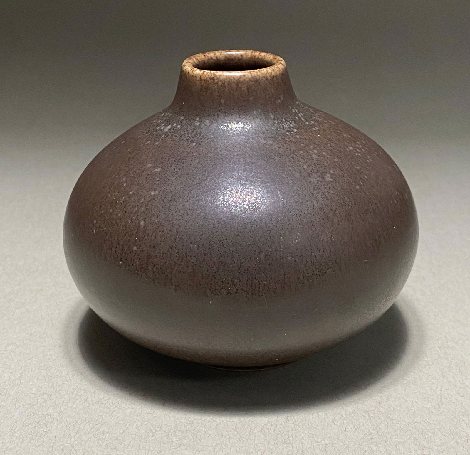 Scandinavian Modernist Dark Brown Haresfur Glazed Ceramic Vase Circa 1960s: Scandinavian Modernist Dark Brown Haresfur Glazed Ceramic Vase Circa 1960s ?? A refined studio ceramic vase featuring an elegant spherical form with a short cylindrical neck. The piece showcases a dar
