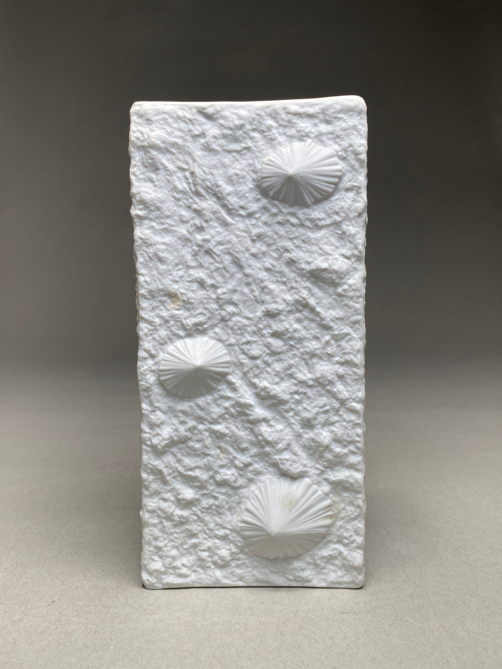 Heinrich Fuchs for Hutschenreuther, Nautical Themed White "Op Art" Vase, 1970s: Heinrich Fuchs for Hutschenreuther, White "Op Art" Vase, 1970s Vase from Hutschenreuther's "Op Art" line exemplifies Heinrich Fuchs's mastery of texture and form. The matte white surface, reminiscent