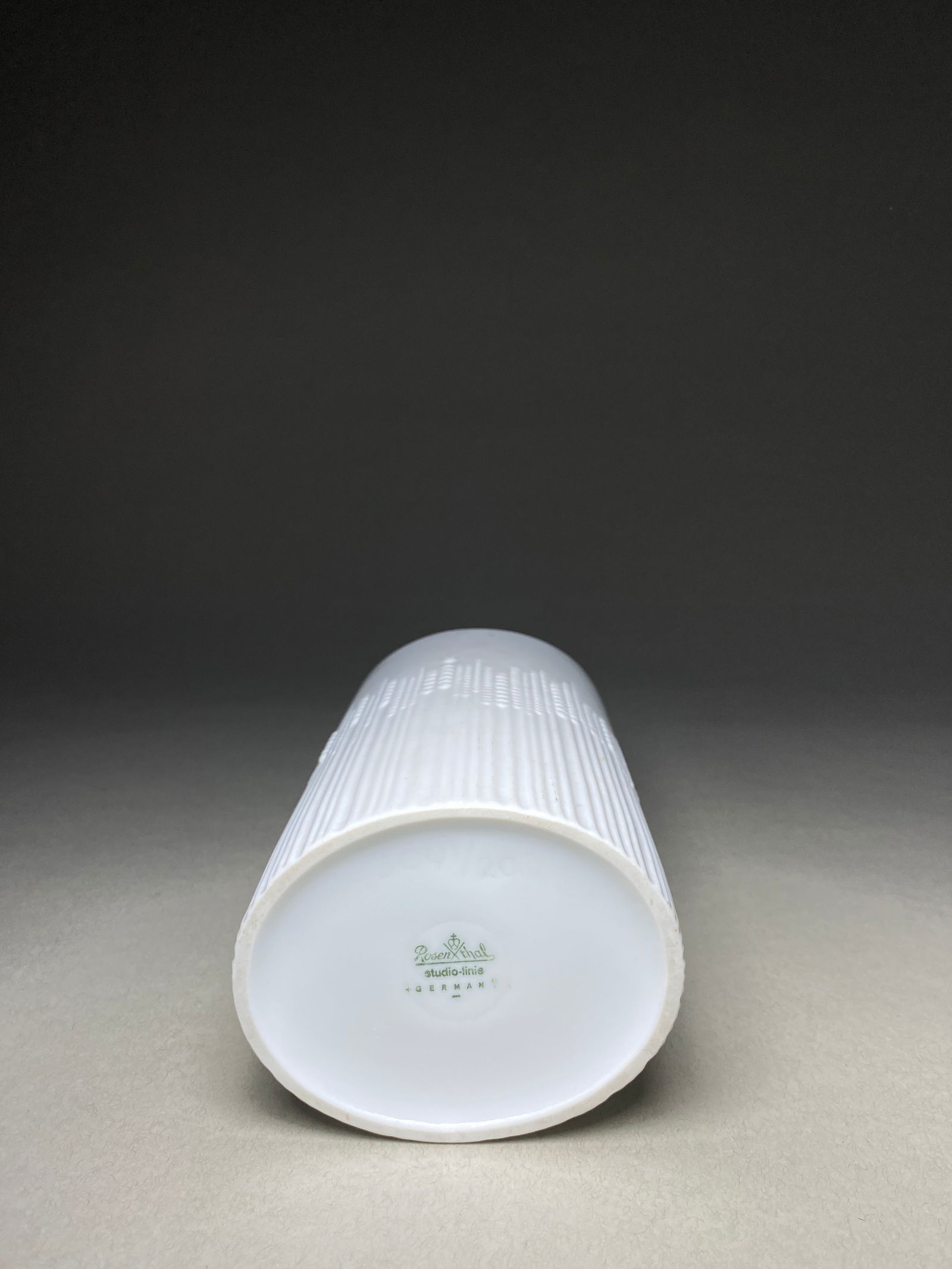 Tapio Wirkkala for Rosenthal, Germany Porcelain cylindrical vase with matte white glaze c1960s: Tapio Wirkkala (1915-1985) designed many classics for the German Rosenthal porcelain factory from 1956 and onwards. Some of his most well-known objects came from the company's Studio-Linie series. The