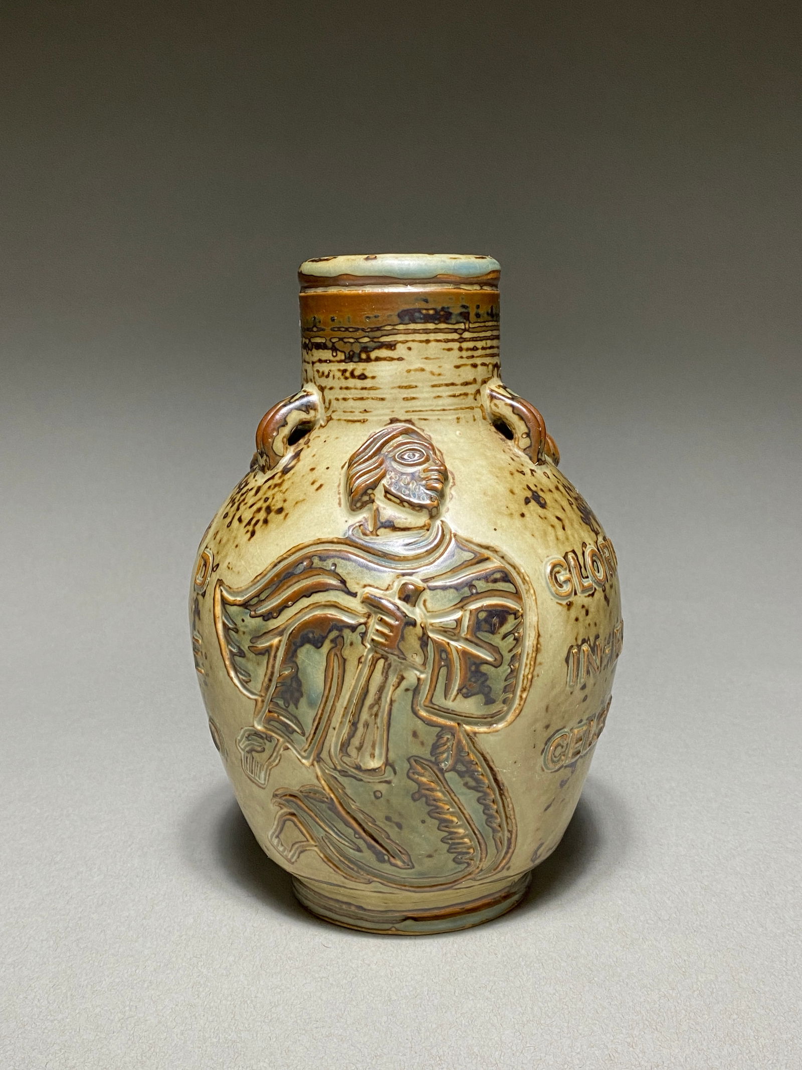 Jais Nielsen "Gloria" Vase, Royal Copenhagen, Denmark, 1920s: Jais Nielsen "Gloria" Vase, Royal Copenhagen, Denmark, 1920s Stoneware vase designed by Jais Nielsen for Royal Copenhagen in the 1920s. The sculptural surface features high-relief motifs of the archan