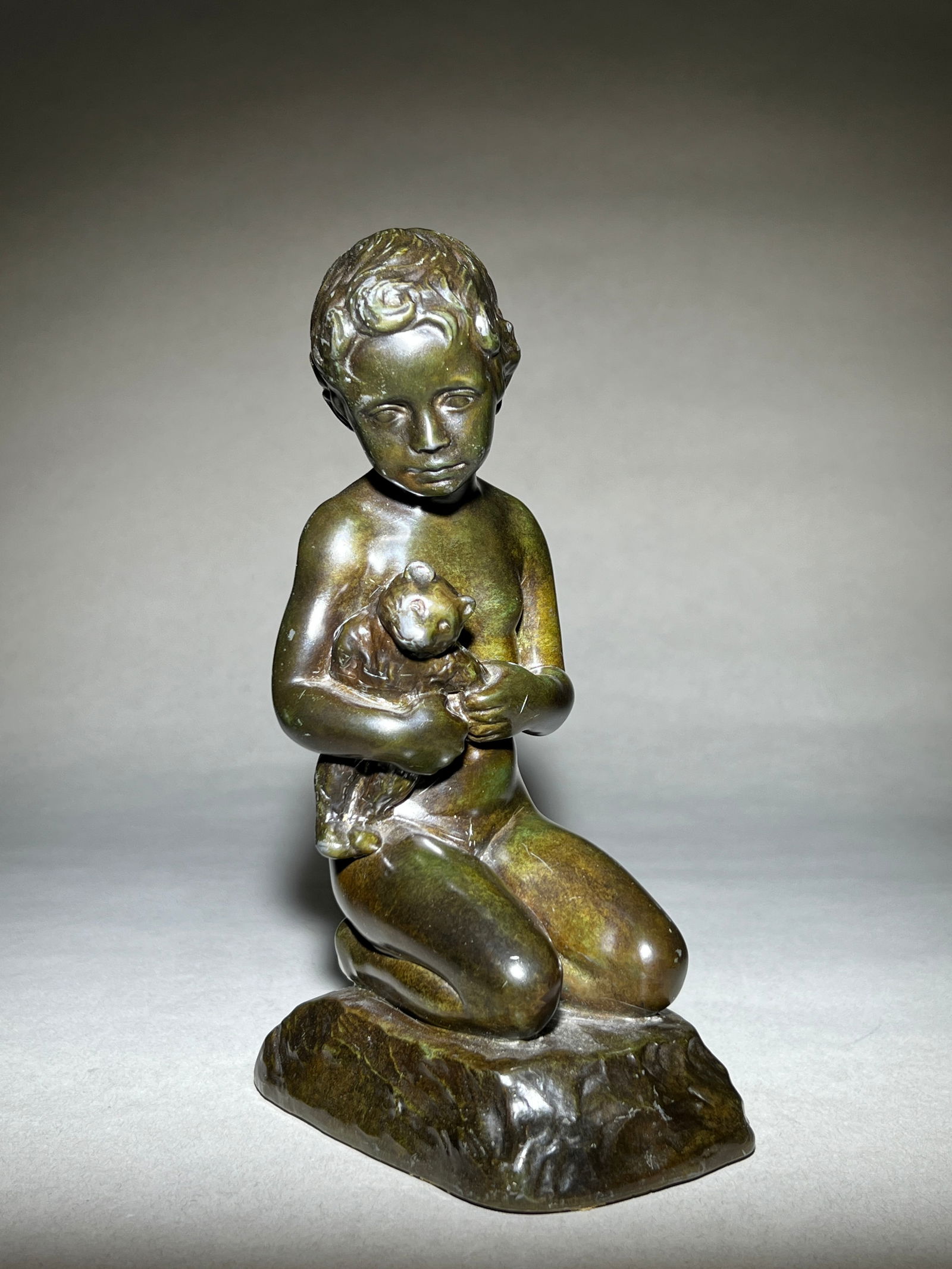 Elna Borch - Just Andersen, Denmark Sculpture of a boy in Disko metal, c. 1930s: Elna Borch (1859-1950) for Just Andersen, own studio, Denmark child Disko metal, c. 1930s Just Andersen (1884 - 1943) was a Danish sculptor and silver smith. He is best known for his neoclassical Scan