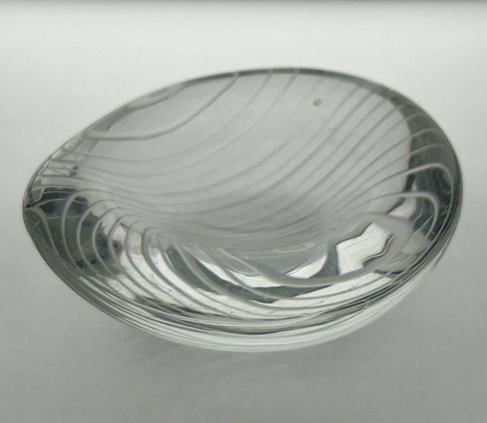 Tapio Wirkkala Engraved Crystal "Leaf" Bowl for Iittala - c.1950s: Tapio Wirkkala Engraved Crystal "Leaf" Bowl for Iittala - c.1950s Small crystal bowl featuring a gracefully curved organic form with delicate linear engraving that creates a rhythmic pattern of fine r