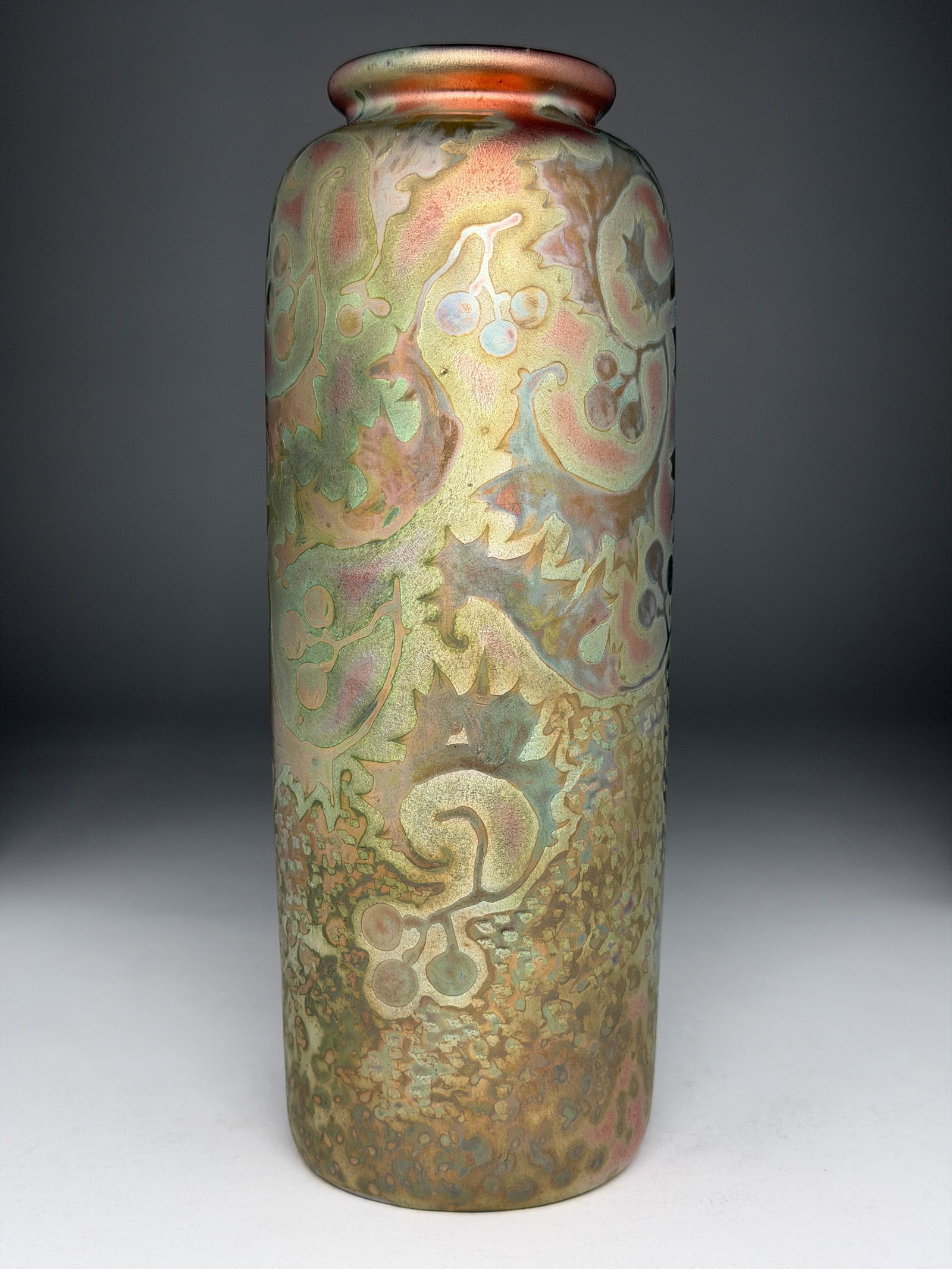 Large Weller Sicard Iridescent Ceramic Vase with Botanical Berry Motifs - Early 20th Century: Large Weller Sicard Iridescent Ceramic Vase with Botanical Berry Motifs - Early 20th Century This elegant cylindrical vase presents a tall, refined form with a slightly rolled rim and gently tapering
