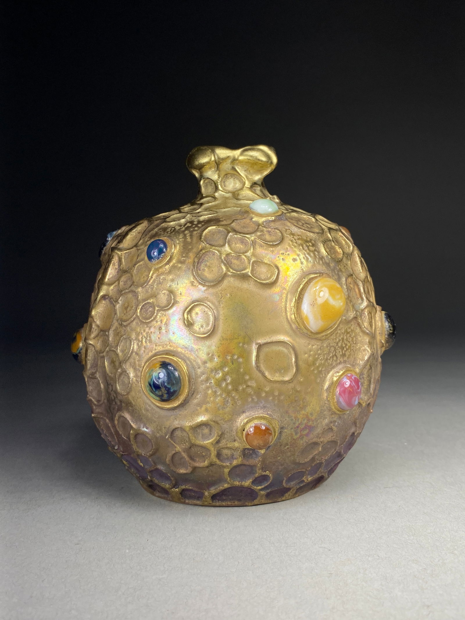 Amphora Art Nouveau "Gres Bijou Spherical Vase" - Circa 1900-1910: Amphora Art Nouveau Vase "Gres Bijou Spherical" - Circa 1900-1910 This striking Art Nouveau vase features a spherical form with delicate flared neck and undulating rim. The piece showcases Amphora's r