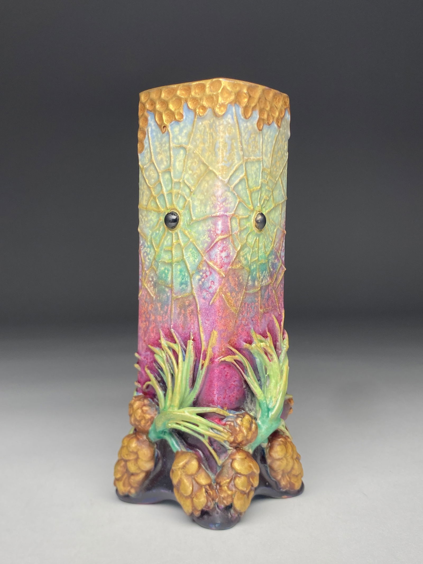 Amphora RSTK Vase with Pinecones and Spider Web Motif - Early 20th Century: Amphora RSTK Vase with Pinecones and Spider Web Motif - Early 20th Century This rectilinear vase is modeled with four distinct sides, each surface united by a dramatic spider web motif radiating outwa