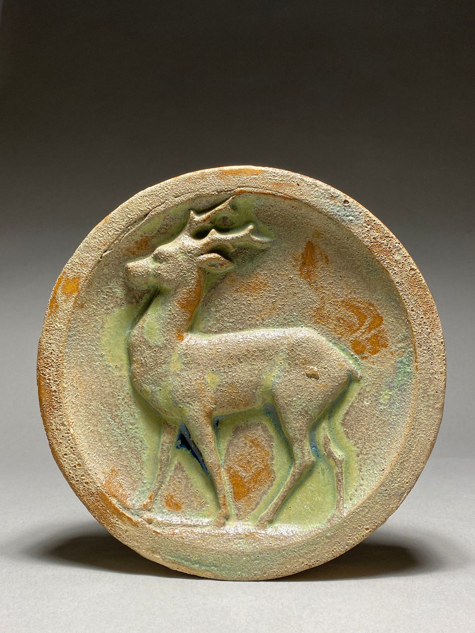 Rare Alexandre Bigot, Art nouveau tile depicting a gazelle, 19-20th century: Rare Alexandre Bigot, Art nouveau tile depicting a gazelle, 19-20th century This elegant glazed stoneware panel exemplifies a refined artistry by Alexandre Bigot. The panel depicts a gazelle in a stri