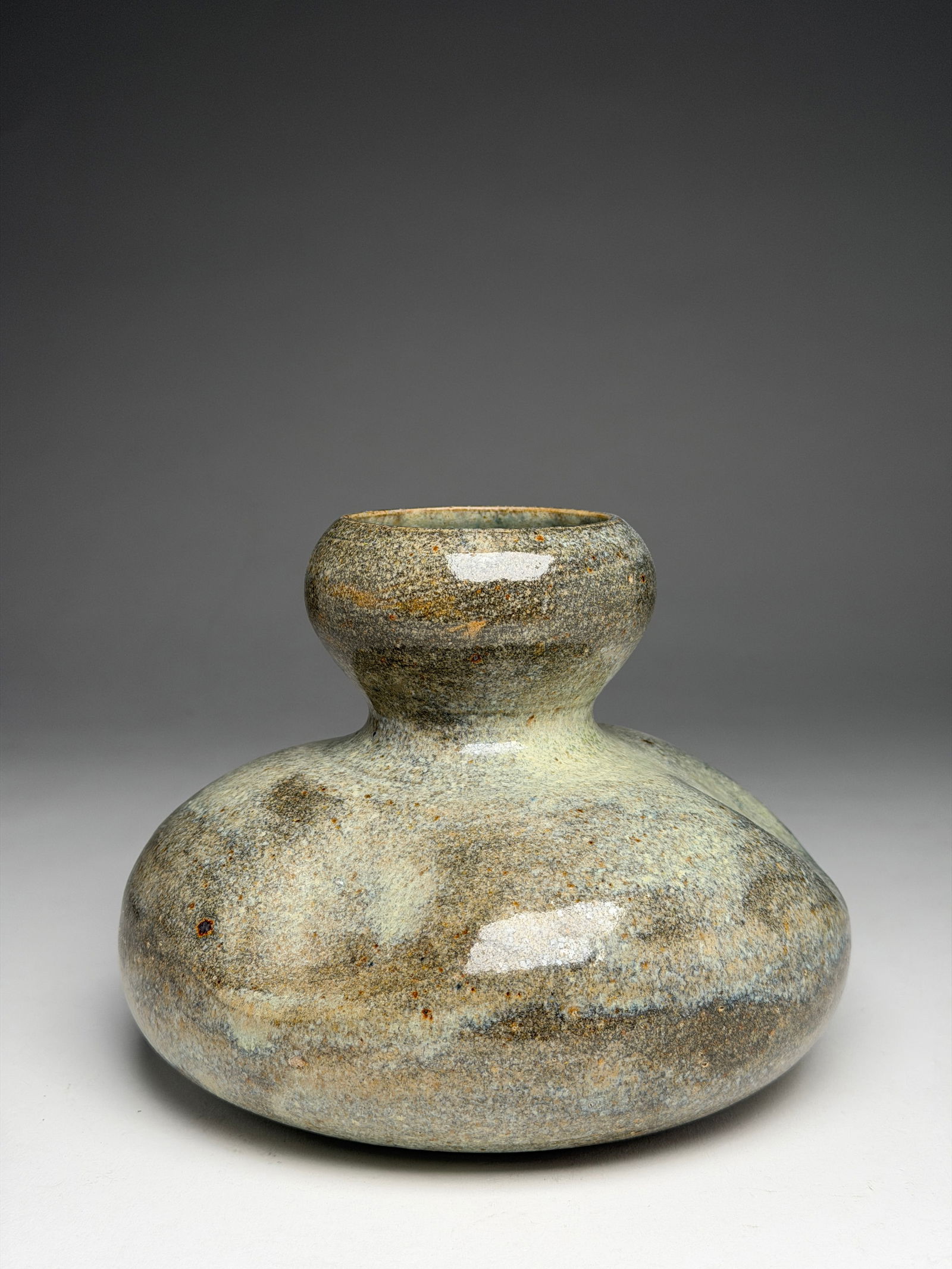 Alexandre Bigot Large Stoneware Double Gourd Vase - Early 20th Century: Alexandre Bigot Large Stoneware Double Gourd Vase - Early 20th Century This compact double gourd form presents a softly swelling lower body rising into a constricted waist and a rounded, bulbous neck