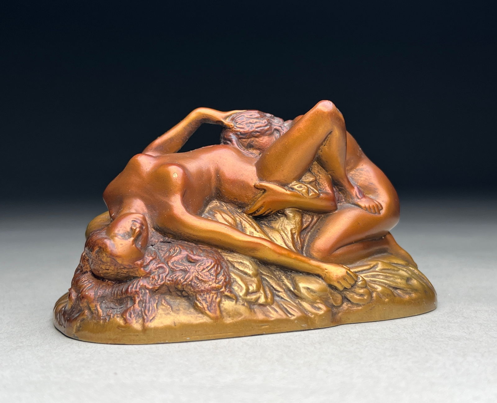 Jef Lambeaux Bronze Sculpture "Lovers" - Late 19th Century: Jef Lambeaux Bronze Sculpture "Lovers" - Late 19th Century This intimate bronze sculpture depicts two entwined nude figures in a passionate embrace, their bodies intertwined atop a base of flowing dra