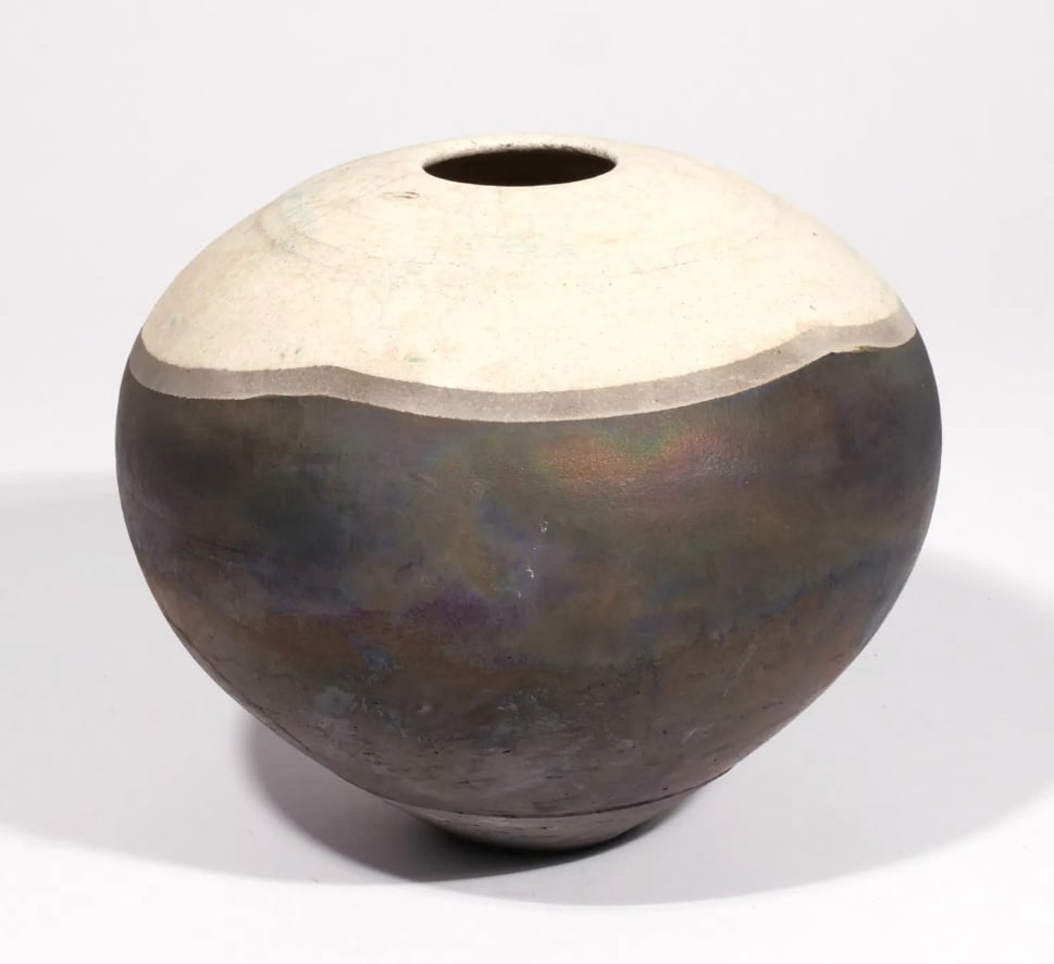 Japanese Raku pottery vessel, 1990s: Japanese Raku pottery vessel, 1990s This vase showcases the dramatic contrasts and spontaneous beauty characteristic of this centuries-old Japanese ceramic tradition. The spherical form features a bol