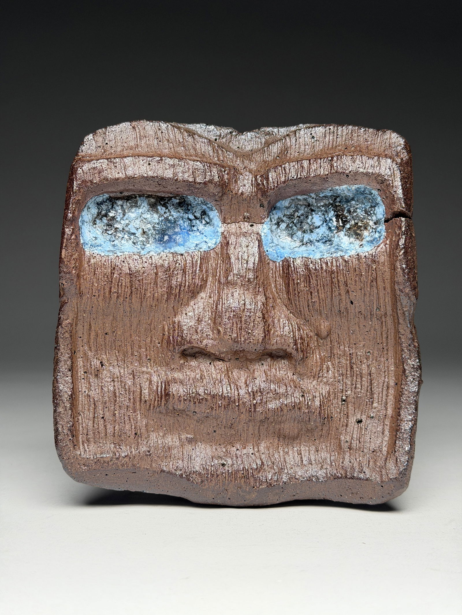 Yve Mas (1997-) Ceramic "Jotunn" Spirit Mask Painting - 2020: Yve Mas (1997-) Ceramic Fire Spirit Mask Painting - 2020 This square ceramic painting is sharply articulated with angular, flame-like contours that converge toward a central, piercing visage. The surf