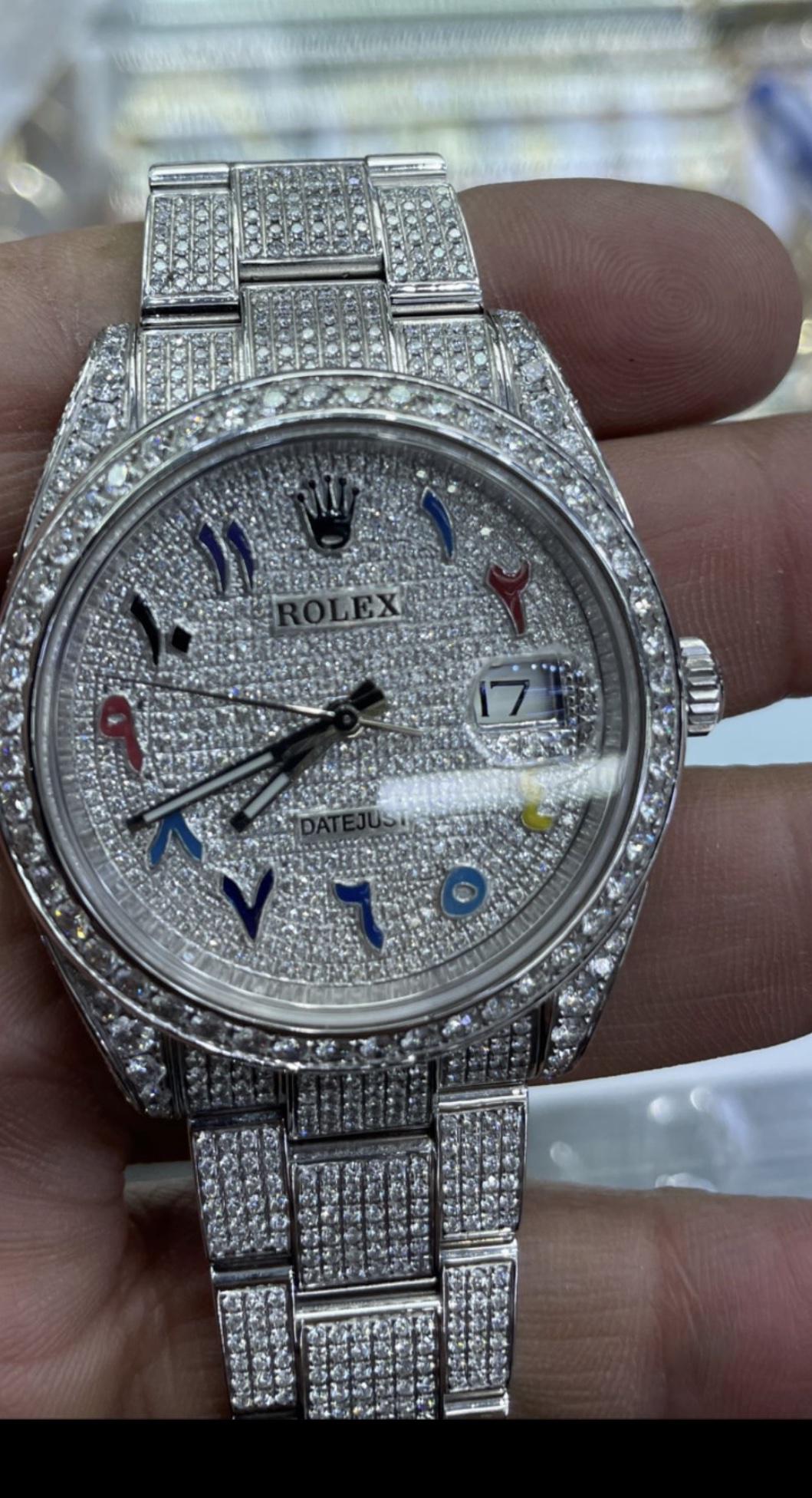 41MM ROLEX WITH DIAMONDS: Retail Price: $70,000.00 / 41MM ROLEX WITH DIAMONDS / COMES WITH APPRAISAL CERTIFICATE