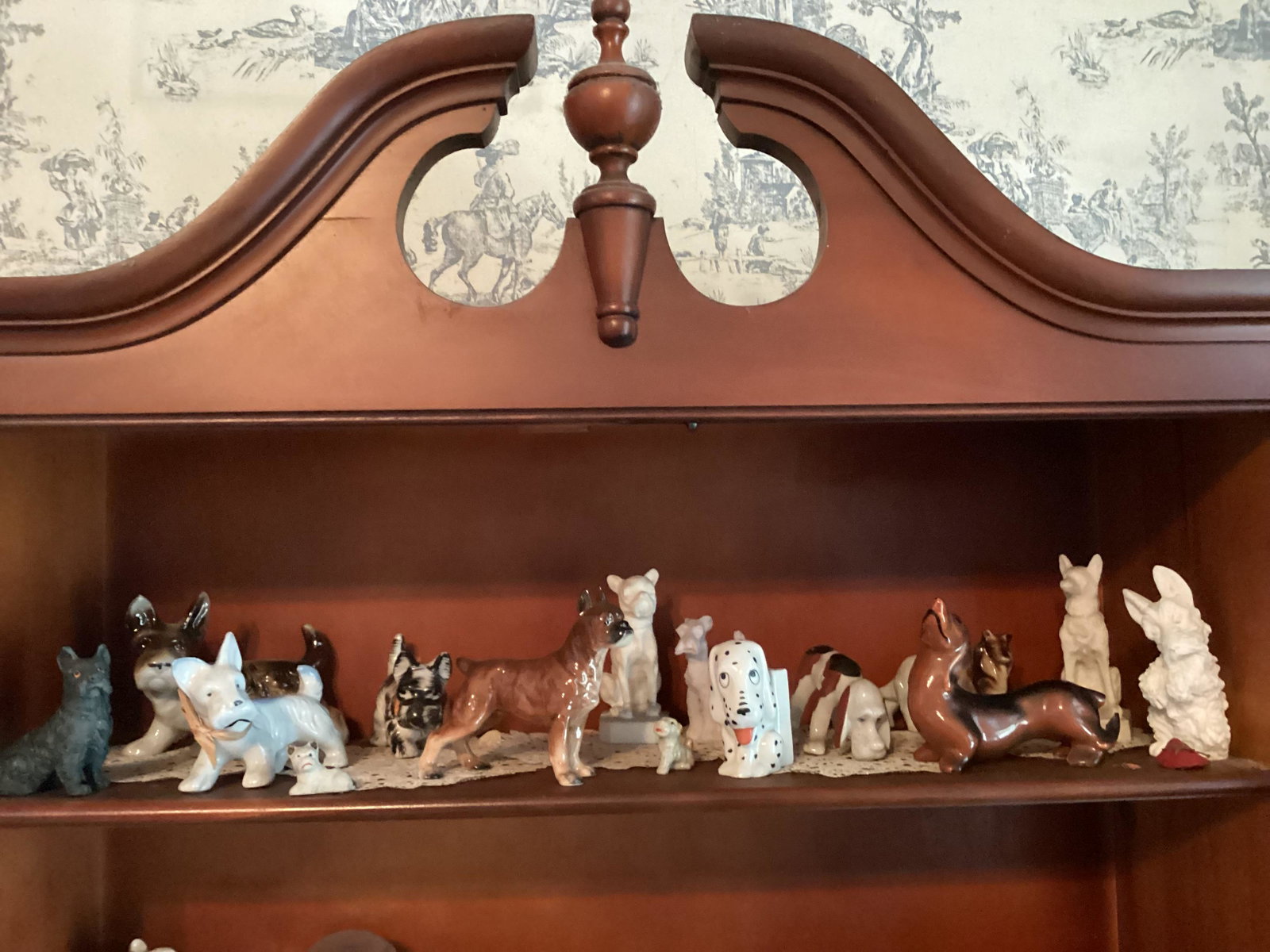 Shelf of Vintage Dog Statues: Shelf of Vintage Dog Statues