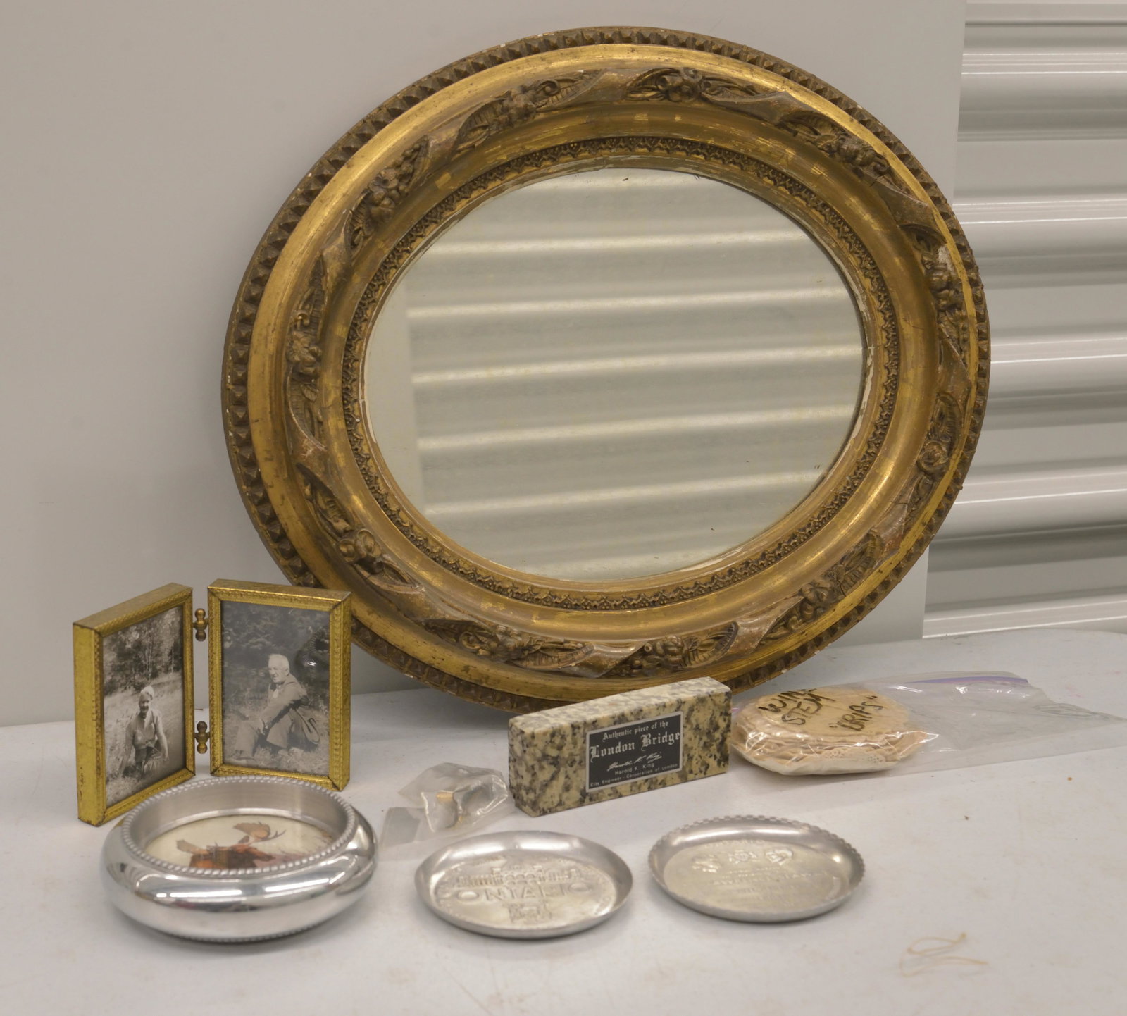 Antique Mirror, Authentic Piece of the London Bridge, and more: Mirror is 14x12