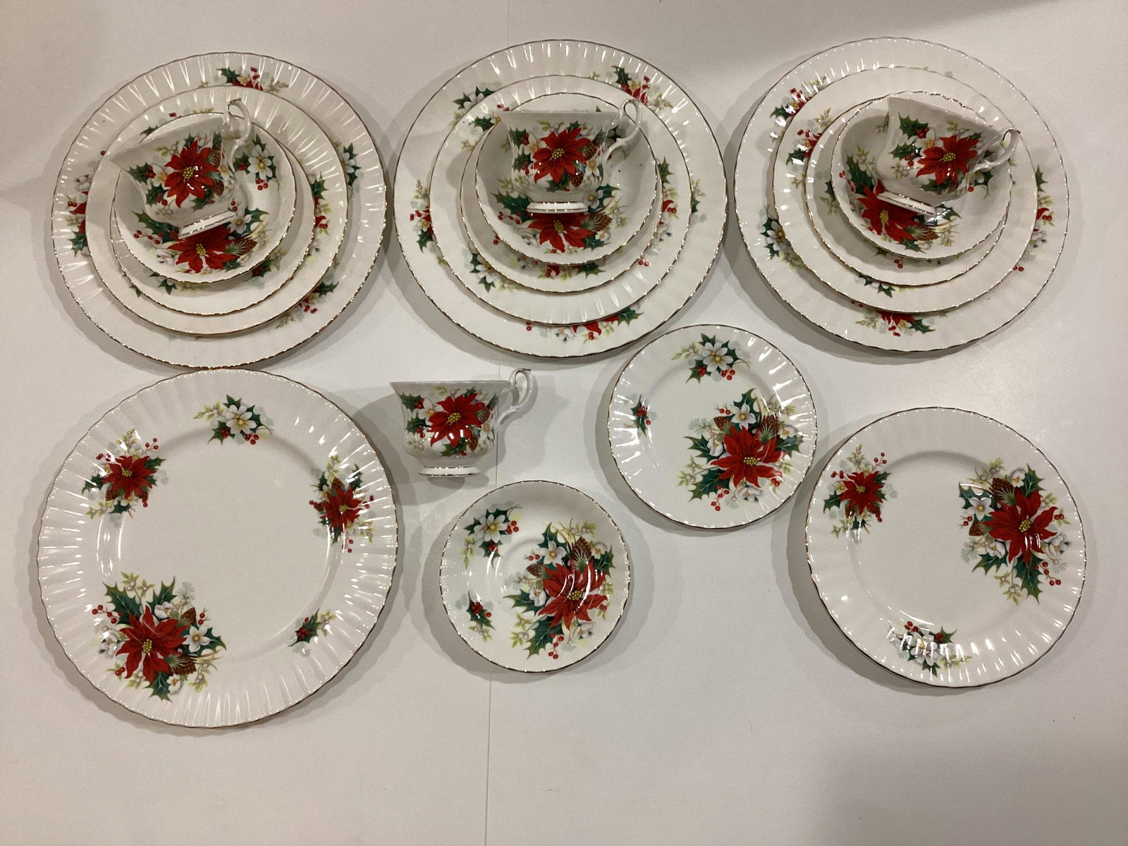 Royal Albert Bone China Poinsettia Five Piece Place Settings: Four Sets - Dinner, Salad, Dessert Plates, Teacup & Saucer