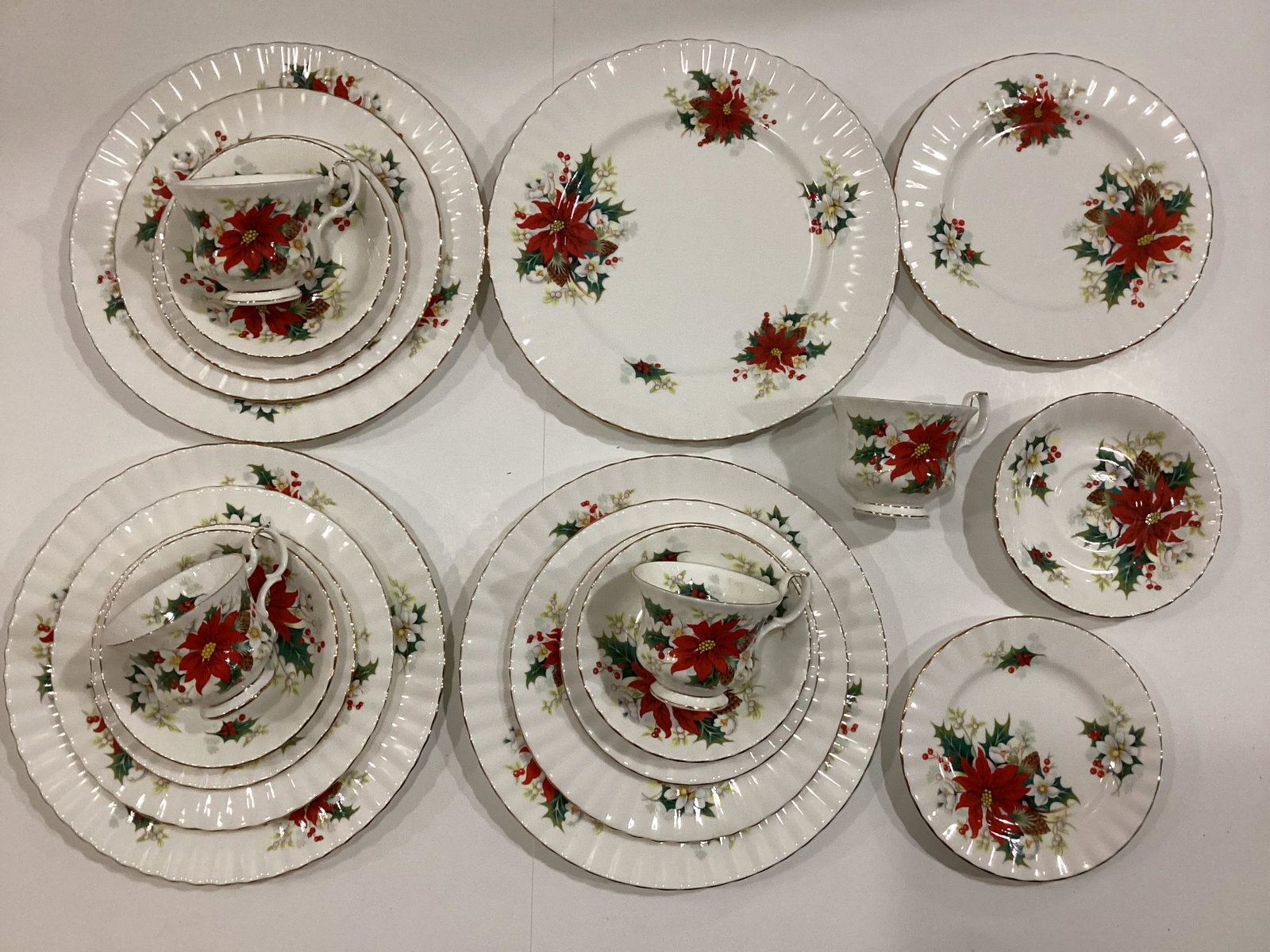 Royal Albert Bone China Poinsettia Five Piece Place Settings: Four Sets - Dinner, Salad, Dessert Plates, Teacup & Saucer