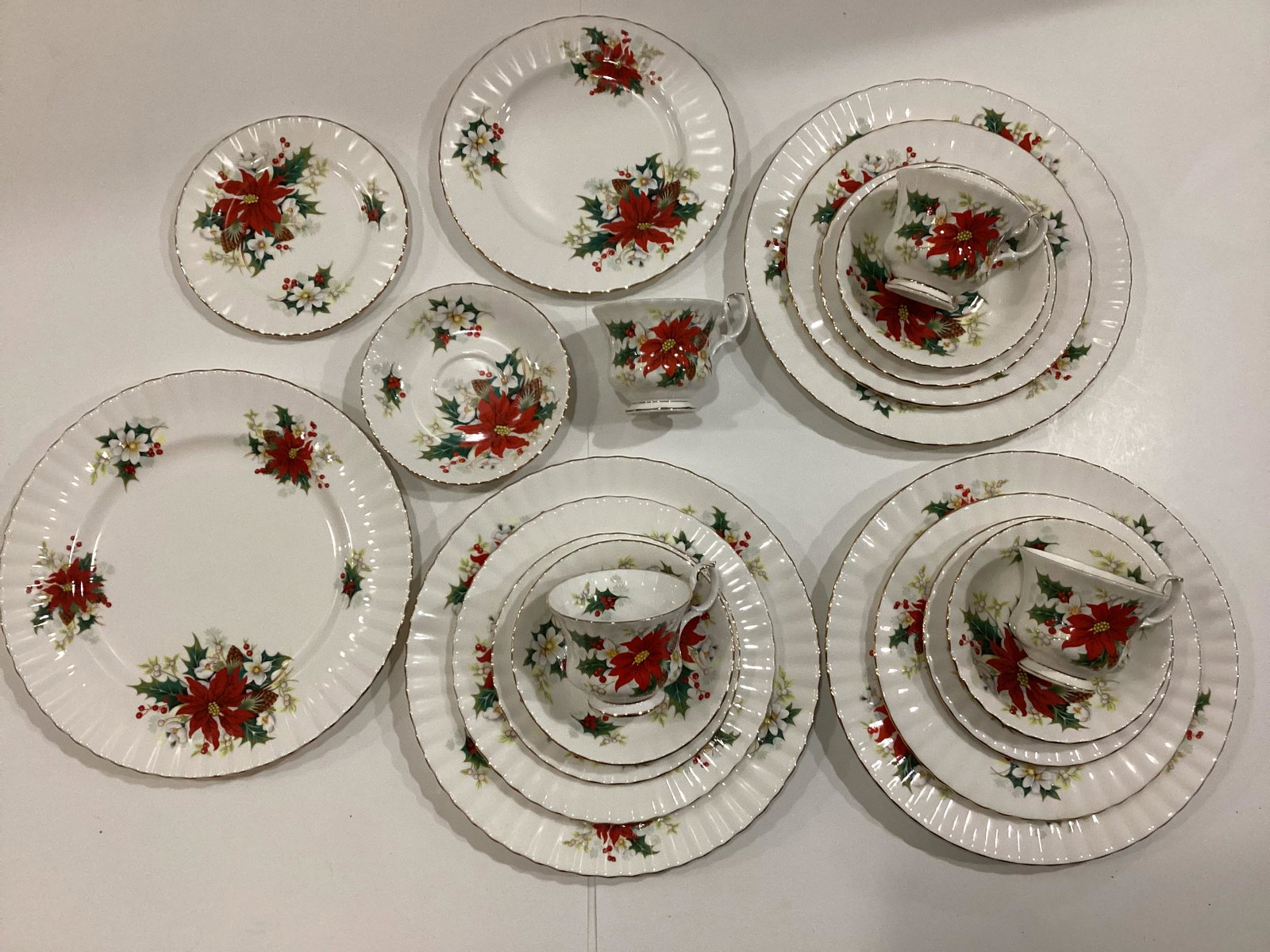 Royal Albert Bone China Poinsettia Five Piece Place Settings: Four Sets - Dinner, Salad, Dessert Plates, Teacup & Saucer