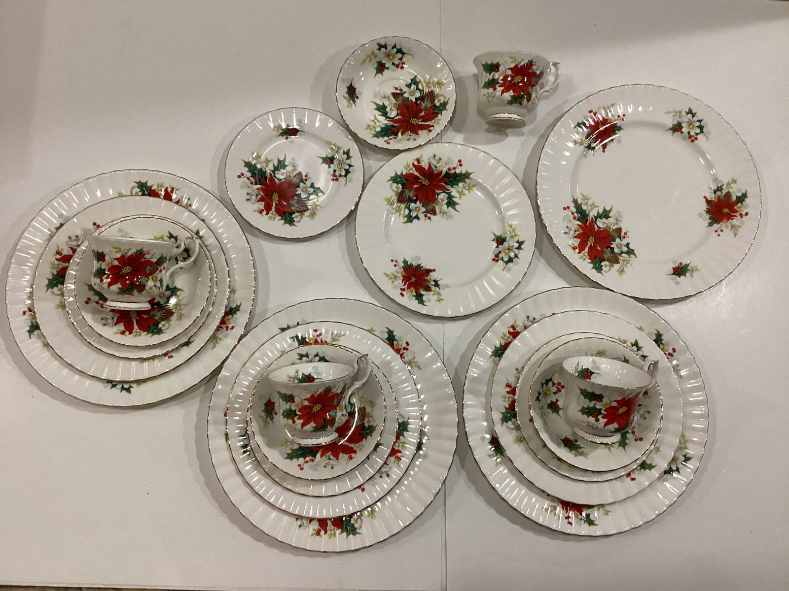 Royal Albert Bone China Poinsettia Five Piece Place Settings: Four Sets - Dinner, Salad, Dessert Plates, Teacup & Saucer