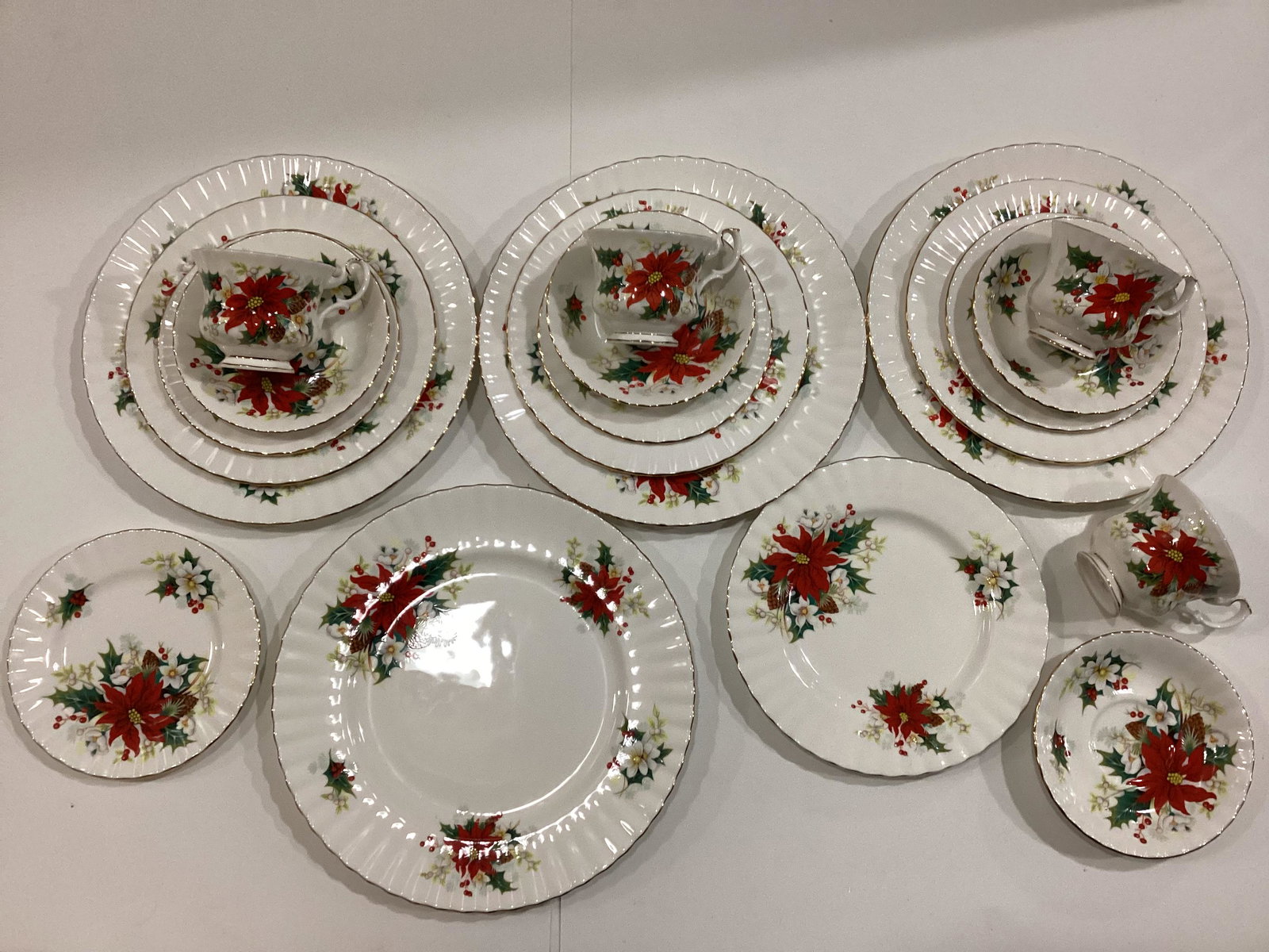 Royal Albert Bone China Poinsettia Five Piece Place Settings: Four Sets - Dinner, Salad, Dessert Plates, Teacup & Saucer