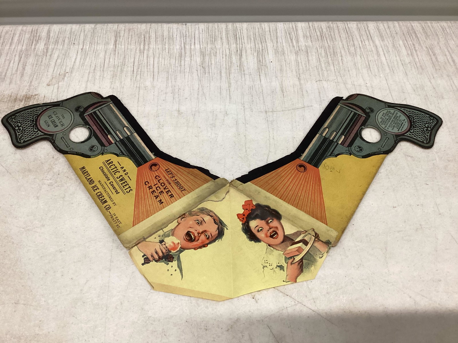 1914 Clover Ice Cream Gun Advertisement: 18"x9" unfolded (two pieces are taped together)