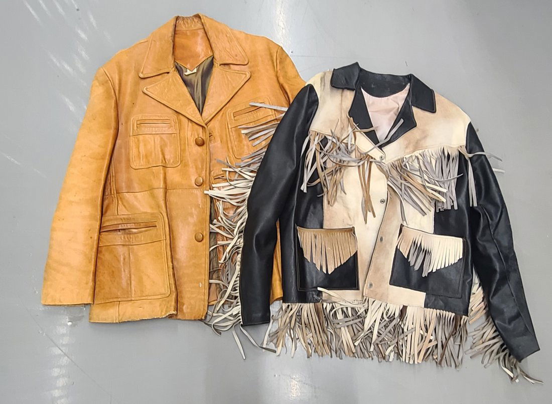 Vintage Men's Leather and Cowhide Fringed Jackets: Need cleaning. Brown jacket labeled 46, Mexico, fringed jacket seems a little smaller. Brown jacket shows a lot of wear, still a great piece.