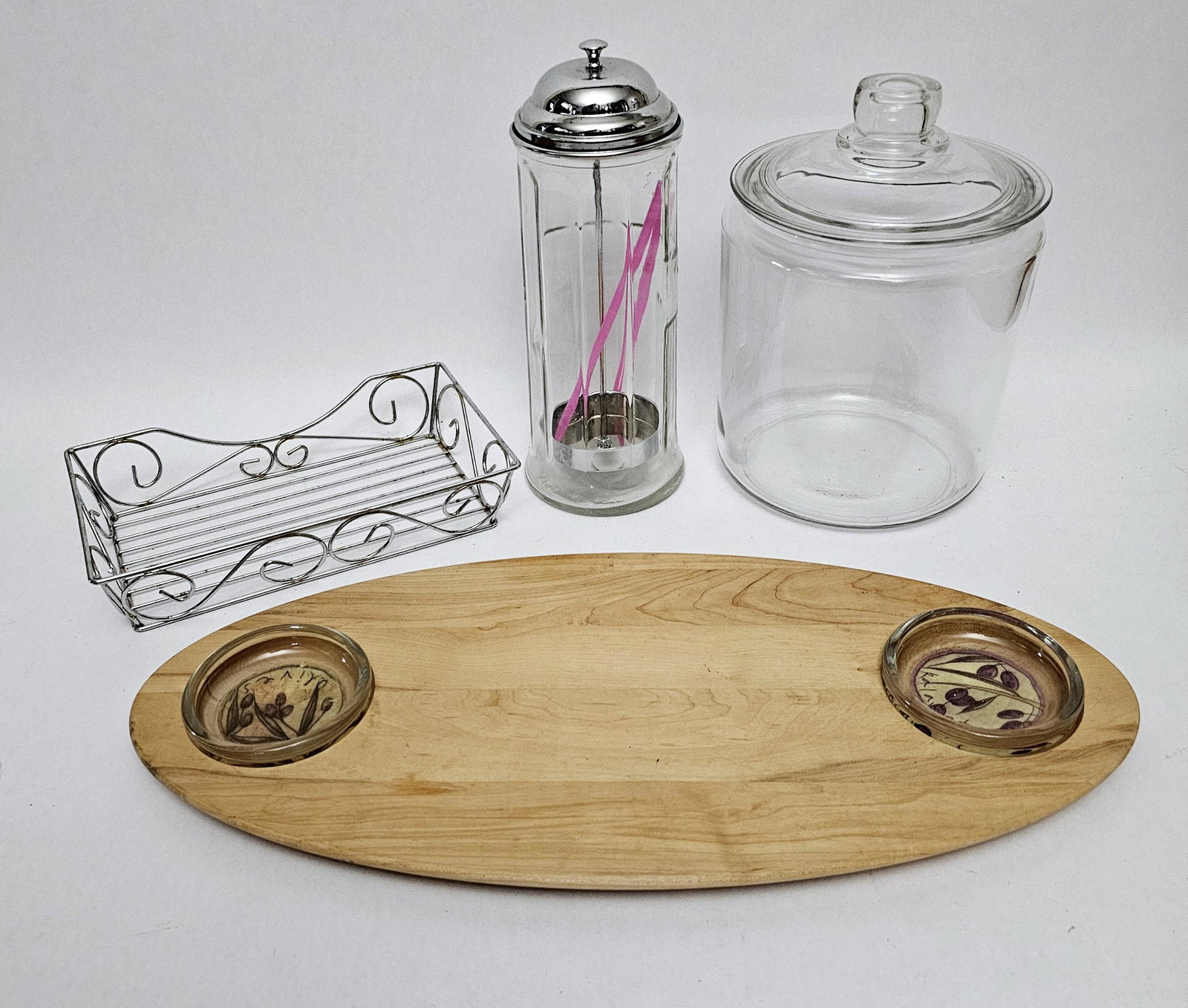 Glass, Metal, and Wood Storage and Serving: Straw holder is glass.