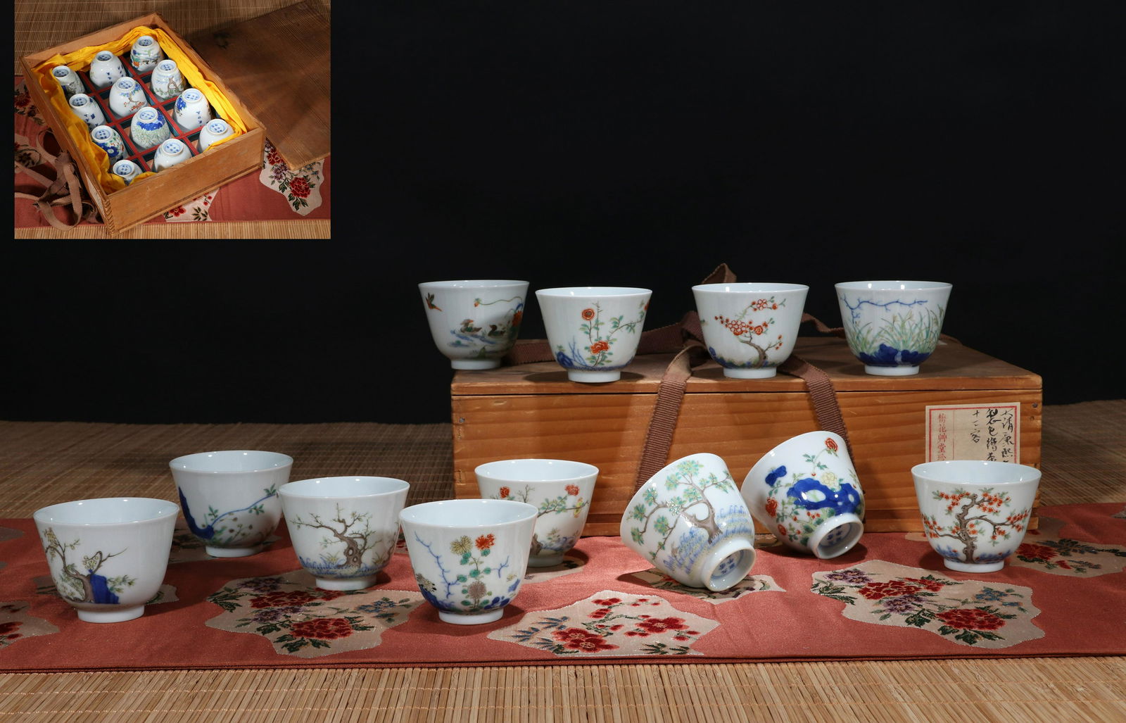 A SET OF TWEELVE CHINESE PORCELAIN BLUE AND WHITE WUCAI FLOWER CUPS (1 of 16)