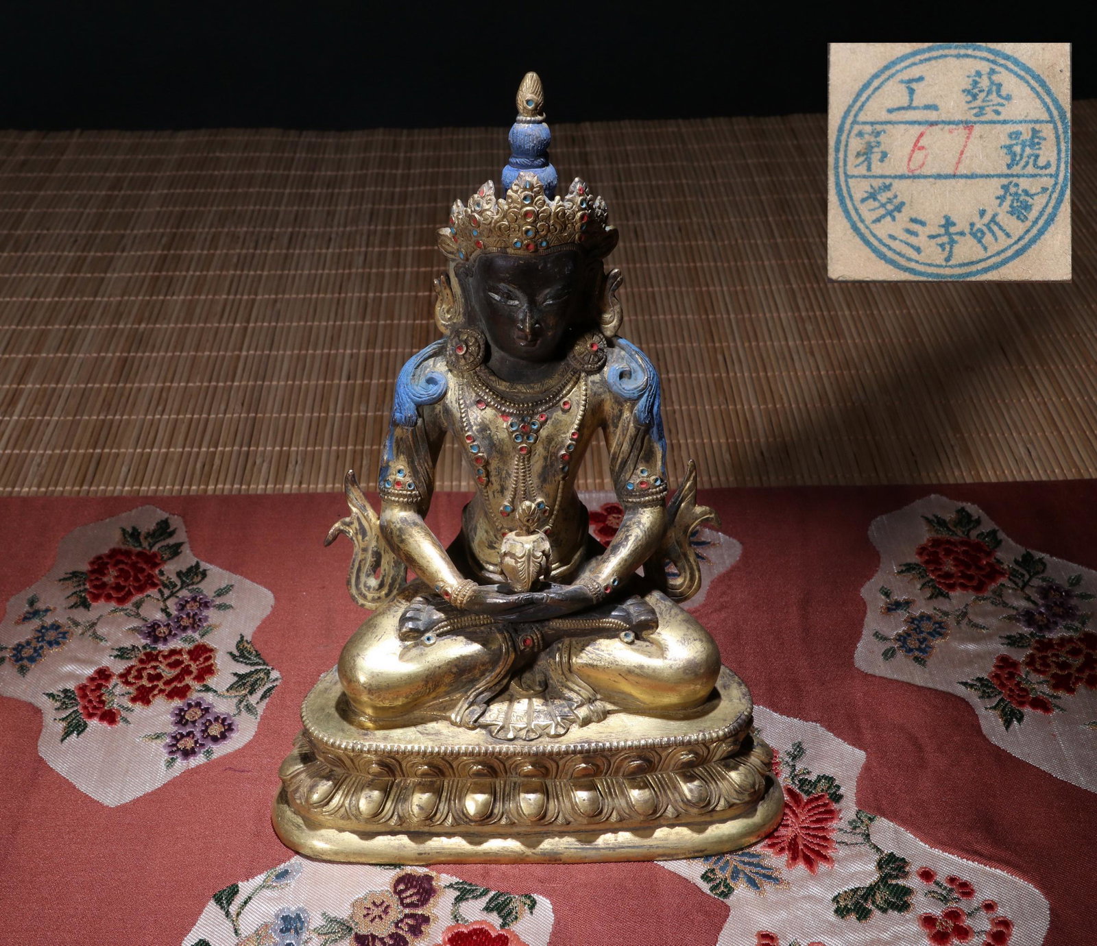 TIBETAN GILT BRONZE SEATED BUDDHA: TIBETAN GILT BRONZE SEATED BUDDHA. H.21.5cm LOT 52 TO LOT 182 FROM COLLECTION OF OWNER OF PLUM BLOSSOM STUDIO. The owner of Plum Blossom Studio is Yakichiro Suma, a native of Akita, Japan. Suma is kno