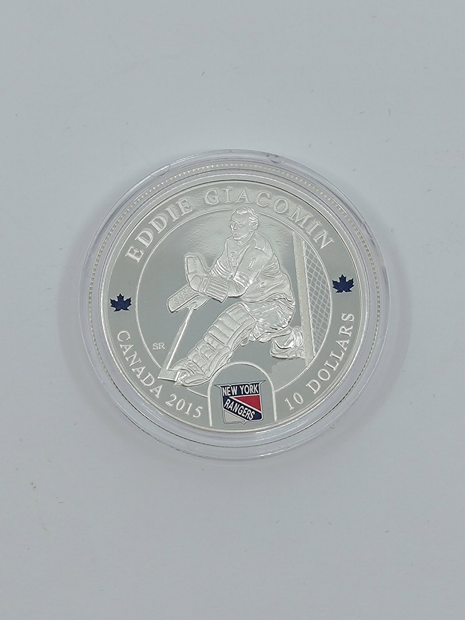 2015 10$ Fine Silver Coin Golies Eddie Giacomin: Title: 2015 10$ Fine Silver Coin Golies Eddie Giacomin Description (FR): Piece de monnaie de 10$ Canada, 2015, argent pure ,9999%, 15,87 g, tirage numerotee : 7104/8000, designer : Steven Rosati , ave