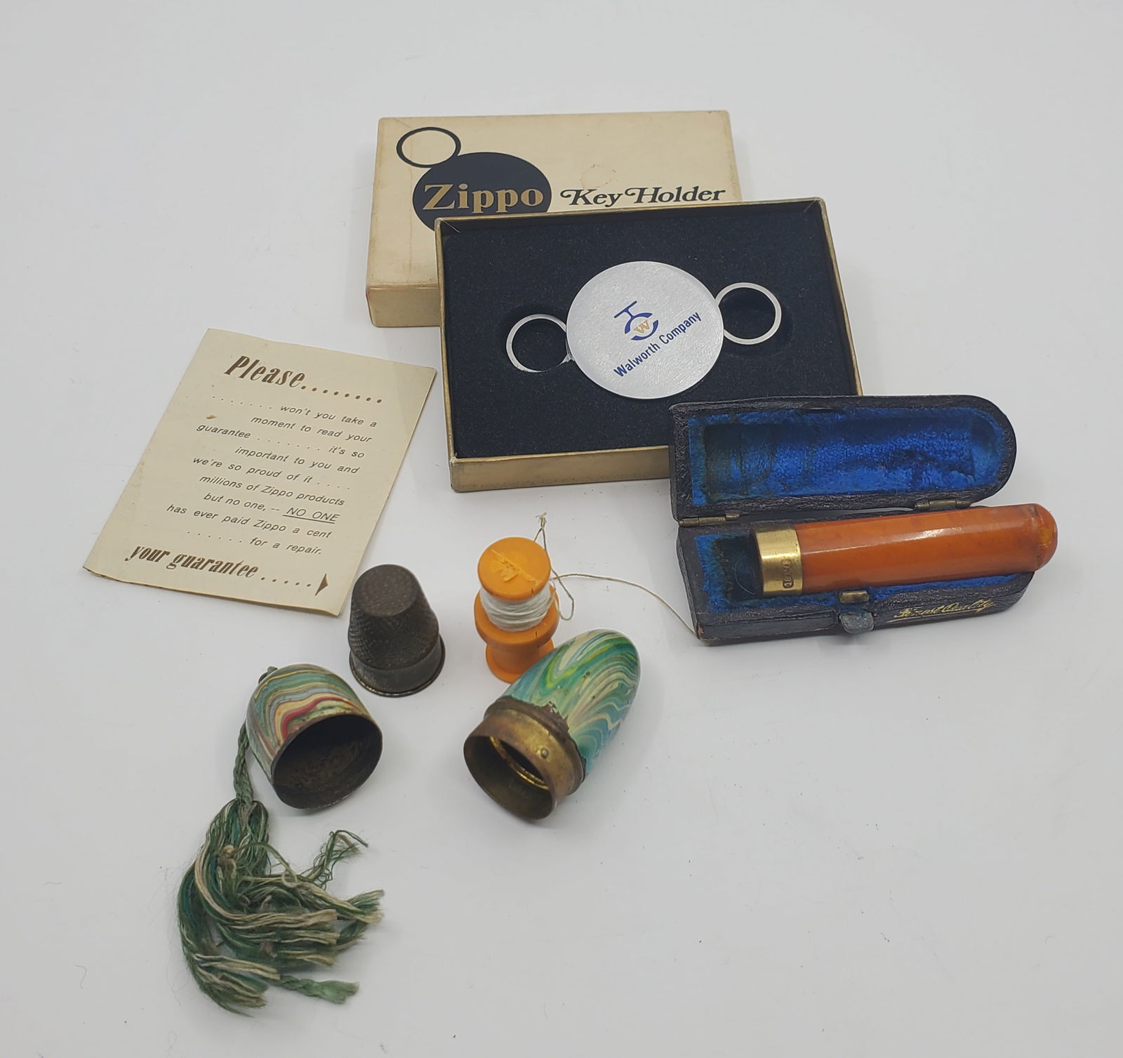 Set of 3 antiques, Zippo Key Holder, German Sewing in enameled box and a   cigarette holder (1 of 14)