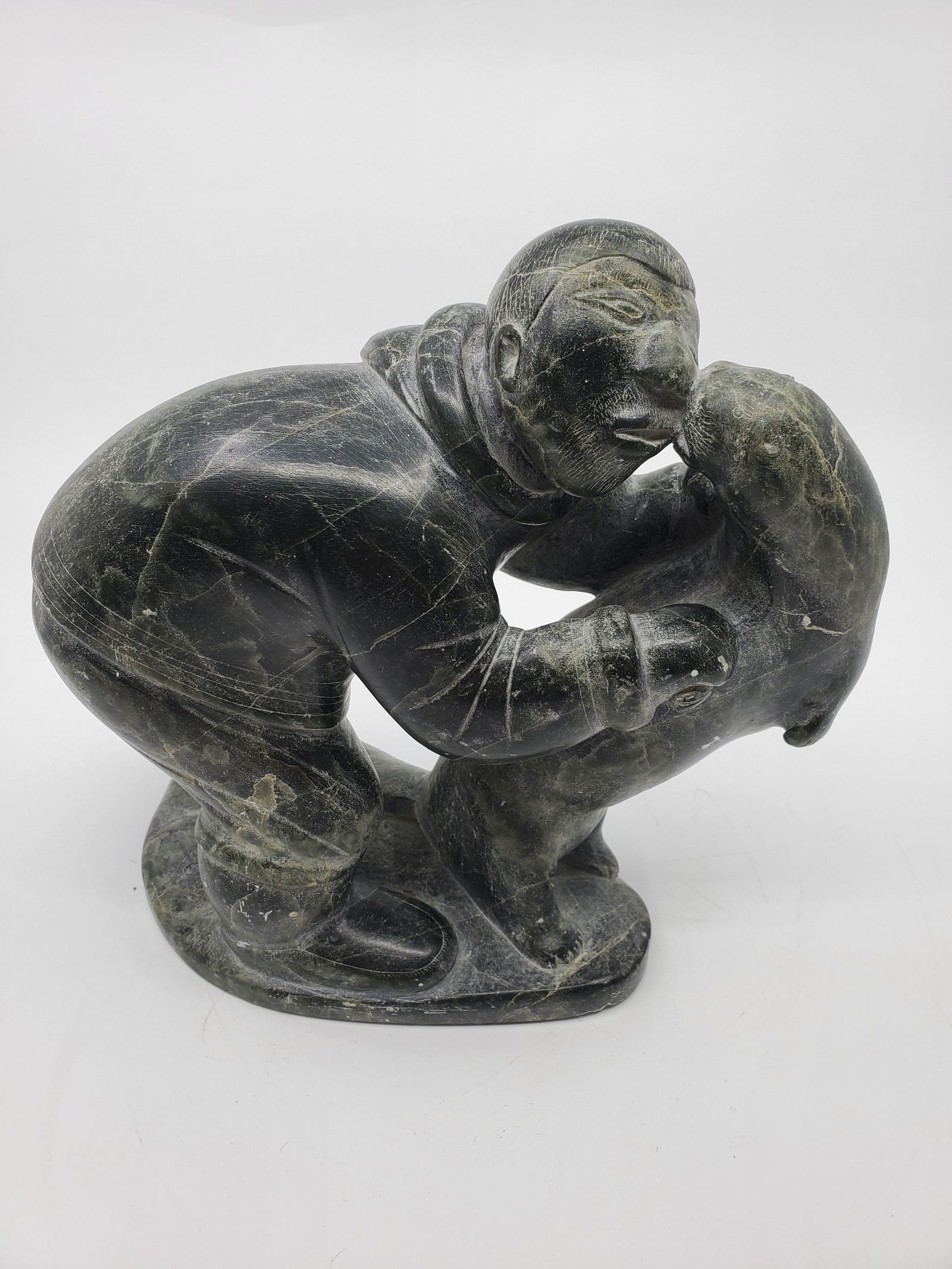 Qumaluk, Tania (1919-1983) Puvirnituq, Man and Seal (1 of 7)