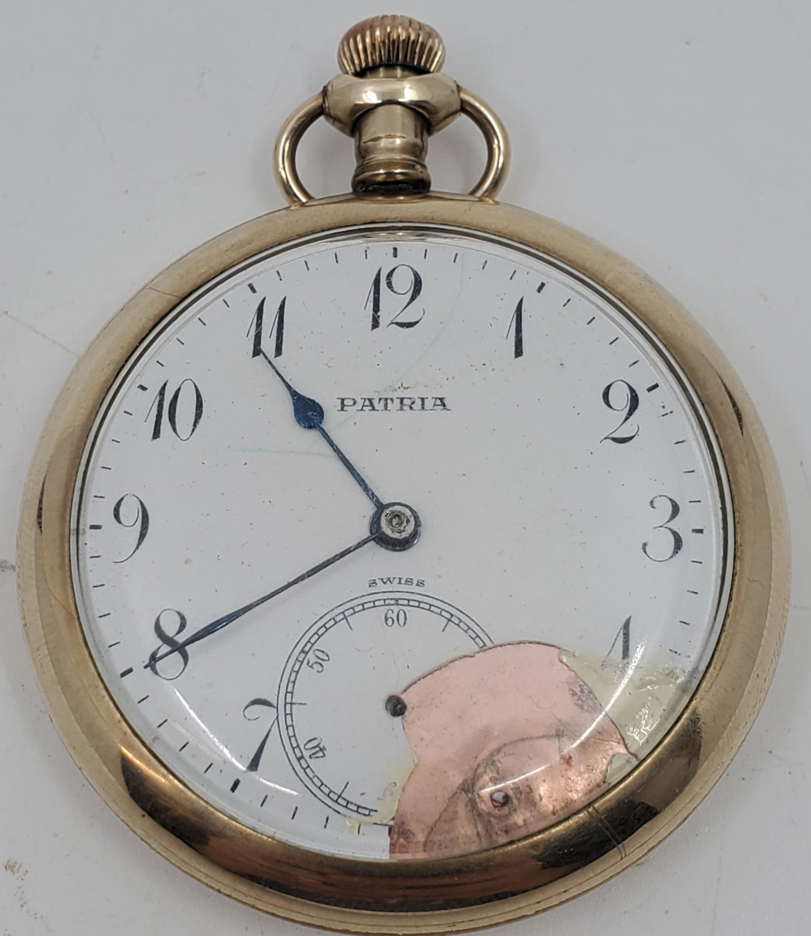 PATACA WATCH CO. - Patria 15J Swiss Pocket Watch GF Case: In BANNER Gold Filled case. 1 7/8" (47.6 mm) in diameter. Severely damaged.