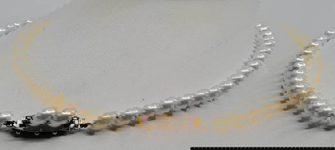 Pearl Choker, 16", 6 mm, 18K Gold Clasp: 56 cultured pearls, including two on the 18K yellow gold (unstamped but verified by testing) clasp, also set with two small rubies Total length, excluding the clasp, is 16" (40.6 cm). Good even color