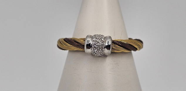 Philippe Charriol, 18KT Gold and Stainless Steel Diamonds Ring: 18KT Gold and Stainless Steel Ring set with diamonds, signed inside Charriol AU750 Steel Size: 6 Weight: 2,7 g