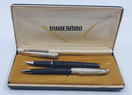 Vintage WATERMAN Fountain and Ball Pen Set: Fountain pen (5 1/4") has 18K white gold nib. Matchind ball pen, 5". Interesting Art Deco desig. In original box. g