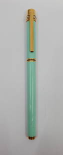 MUST de CARTIER Fountain Pen: 136 mm (5 3/8") long. Turquoise enamel and gold plate. With a signed nib stamped .750 (18K gold)