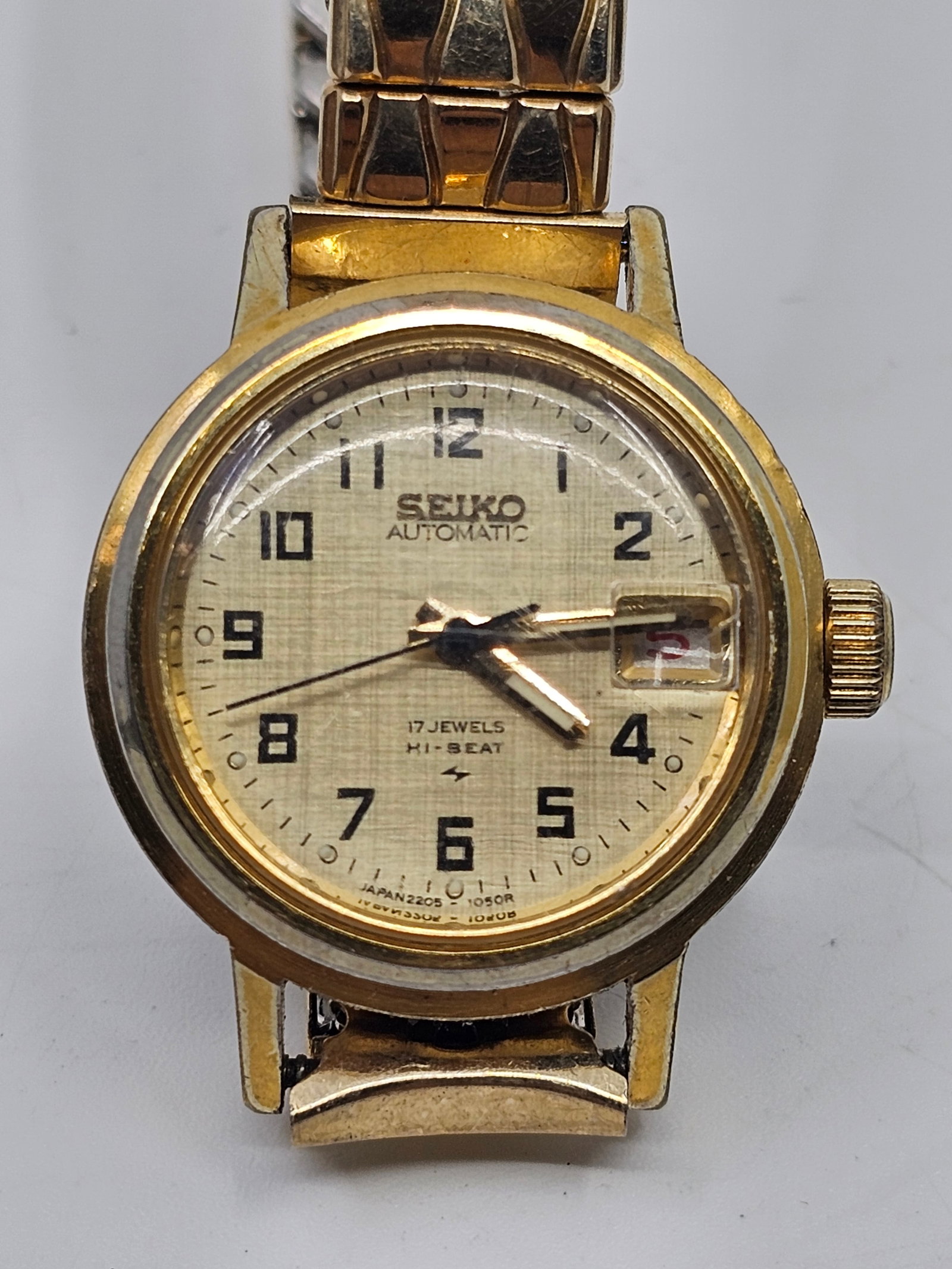Ladies SEIKO Automatic Hi-Beat 17J Working, with Date: 23 mm In working order, although we cannot guarantee it for accuracy With originan gold colored metal expansion bracelet.