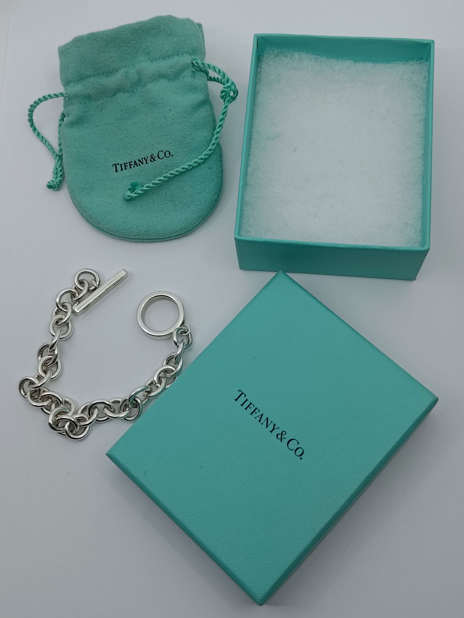 Tiffany & Co, Sterling Silver Bracelet (2004): Sterling Silver Bracelet, signed 2004 Tiffany & Co 925, in its original pouch and box 8" Weight: 36,8 g