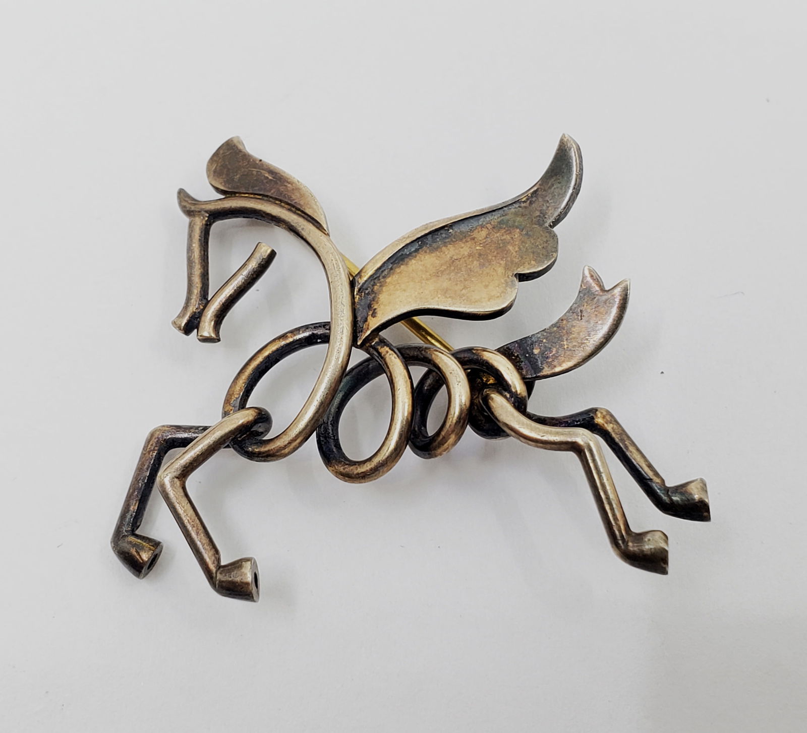 Anton Michelsen, Danish Guilted Sterling silver Horse Brooch: Sterling Silver Guilted Horse Brooch, signed on the back AM 925S P 1 1/2" x 1 1/4" Weight: 5,5 g