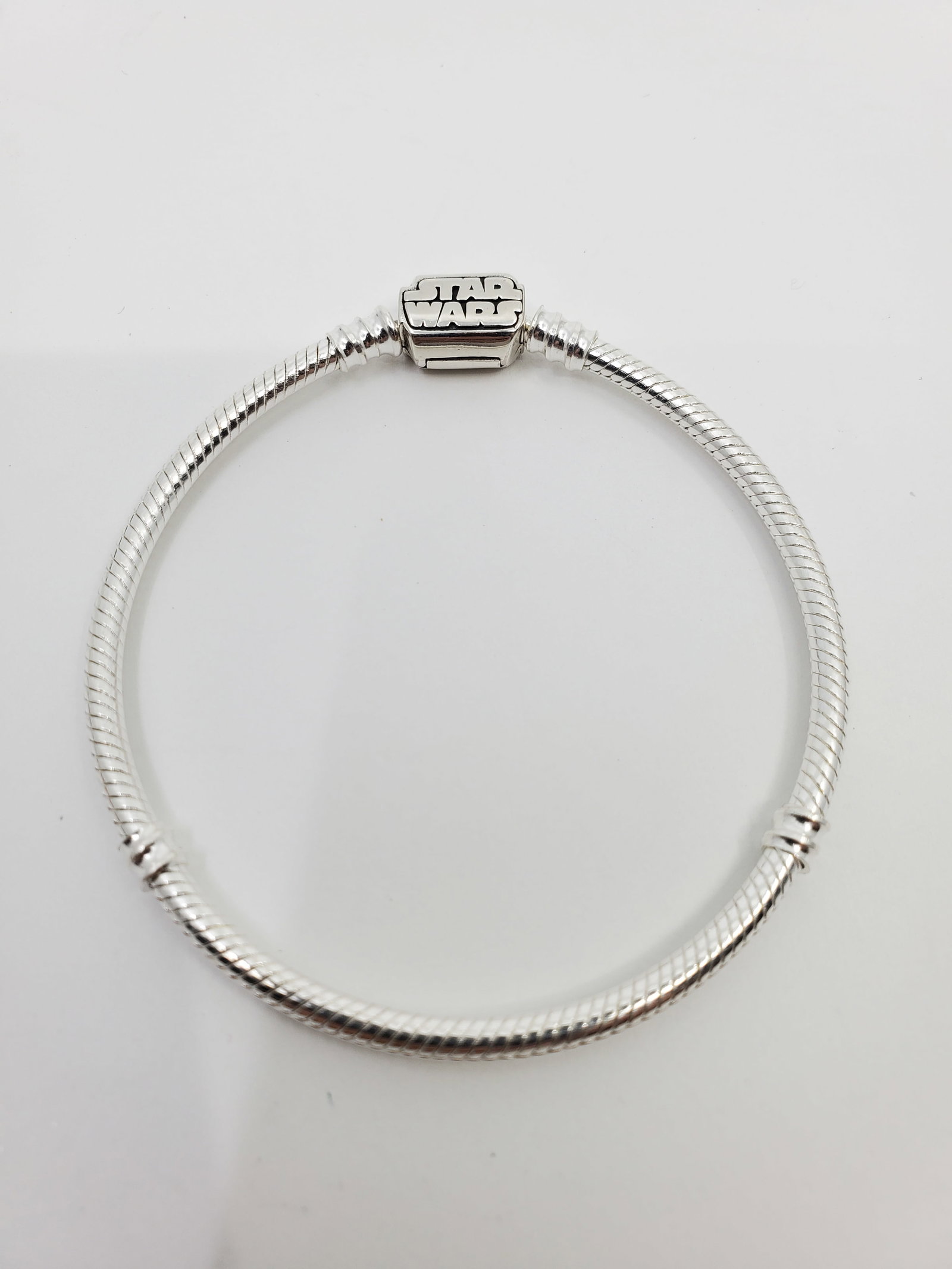 Pandora, Sterling Silver Star Wars Bracelet: Sterling Silver Star Wars Bracelet, signed inside the clasp ALE 925 2 1/2" x 2 1/2" Weight: 13 g