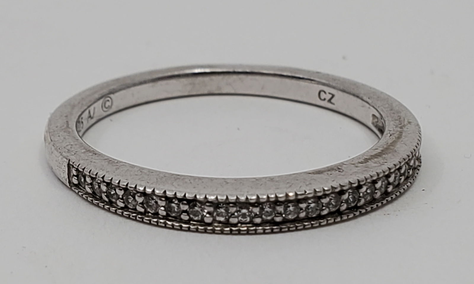 Alwand Vahan, Sterling Silver Diamonds Ring: Sterling Silver Ring, set with Diamonds, signed inside 925 AV Size : 7 Weight: 2 g