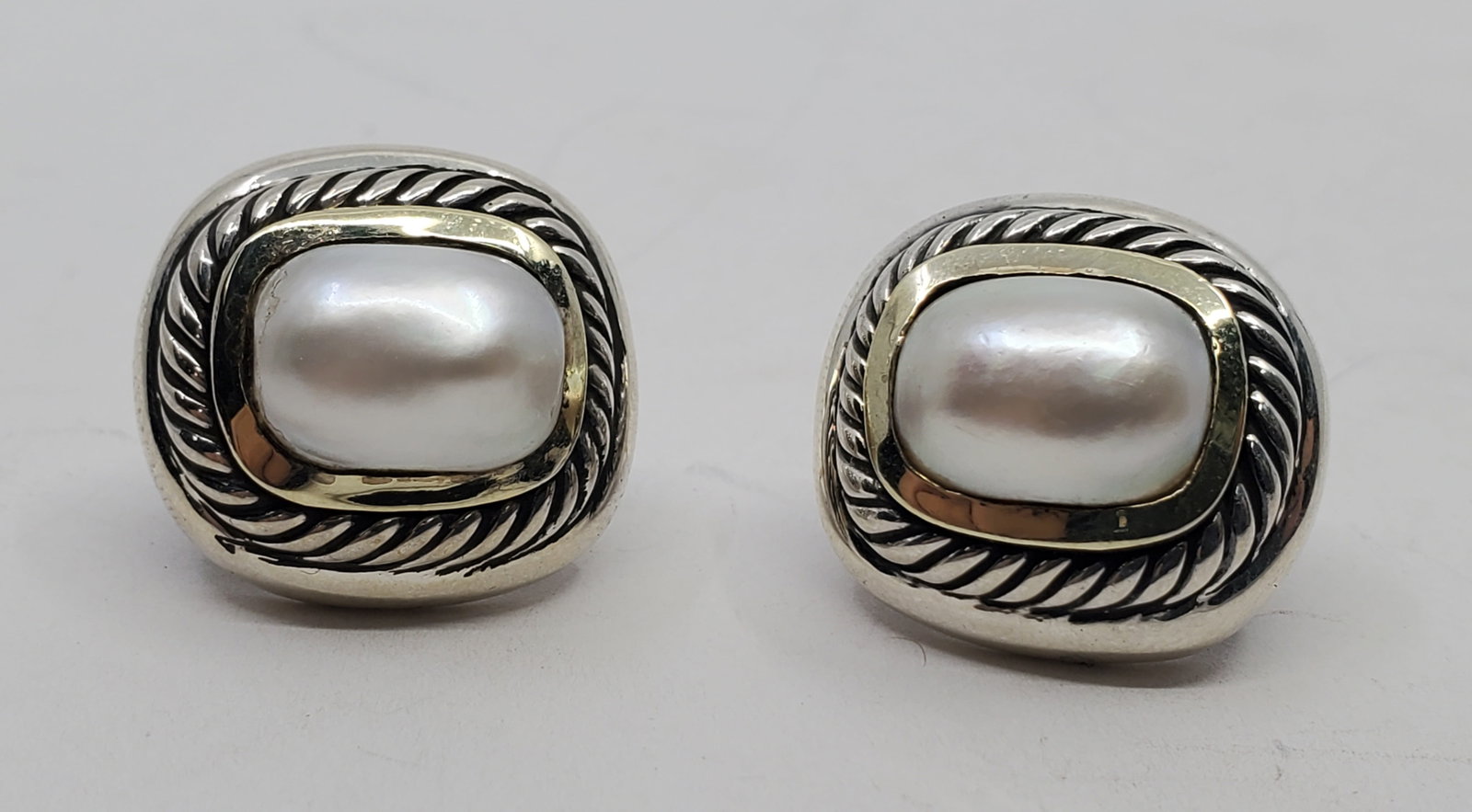 David Yurman, Sterling Silver and 14KT Gold Pearls Earrings: Sterling Silver and 14KT Gold Earrigns, set with Pearls, signed on the back D.Y 925 5853/4" x 3/4" x 3/4"Weight: 19 g