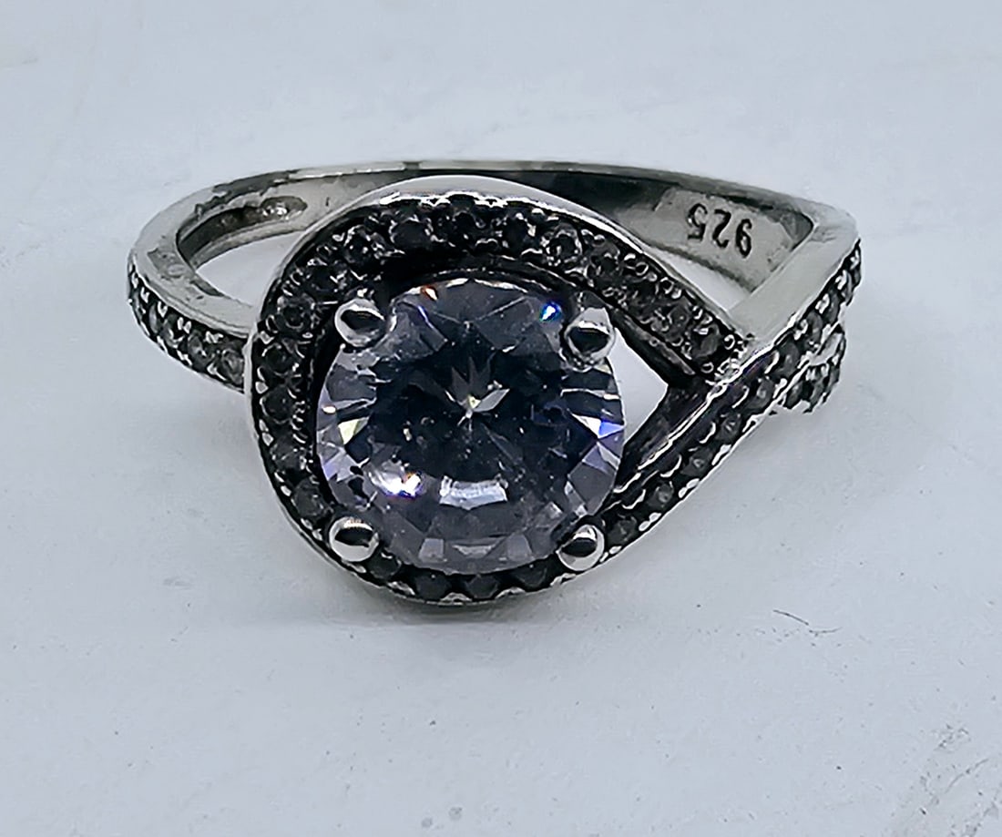 Sterling Silver Fancy Ring: Sterling Silver Ring, set with Zirconium, marked inside 925 Weight 2.58g Size 6