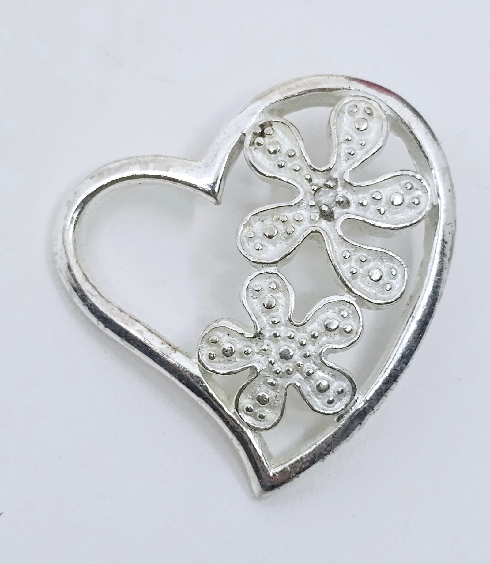 Sterling Silver Heart Pendant: Sterling Silver Heart Pendant, signed on the back TH 925 Weight 2.55 1" x 1"