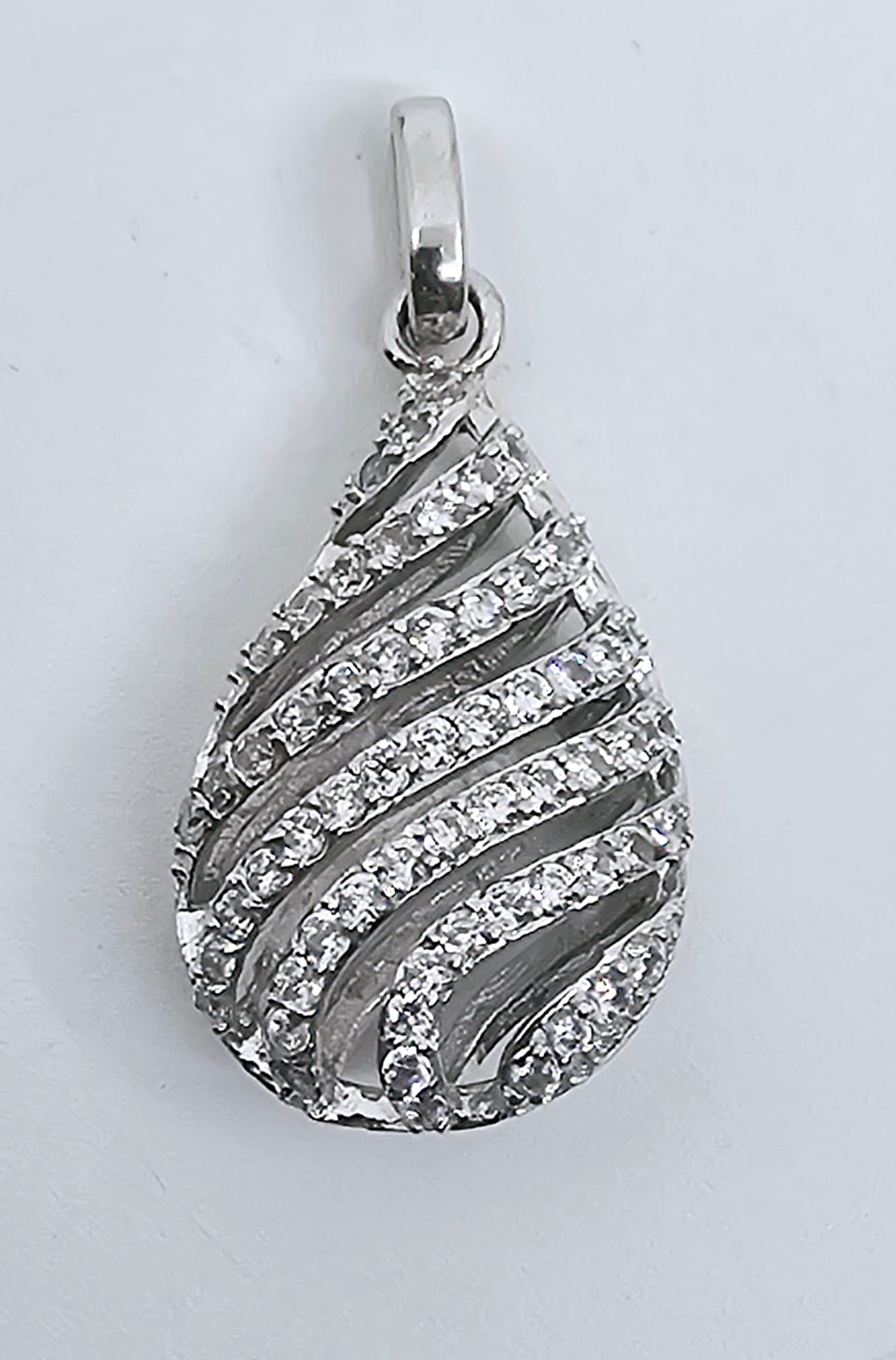 Fancy Sterling Silver Pendant: Sterling Silver Pendant set with Zirconium Weight 3.74g 1"