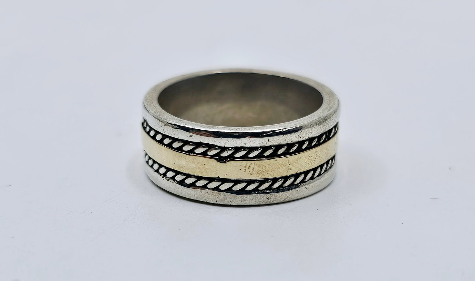 Modernist Sterling Silver and 10K Gold Bangle Ring: Sterling Silver and 10K Gold Bangle Ring Weight 7.61g Size 6